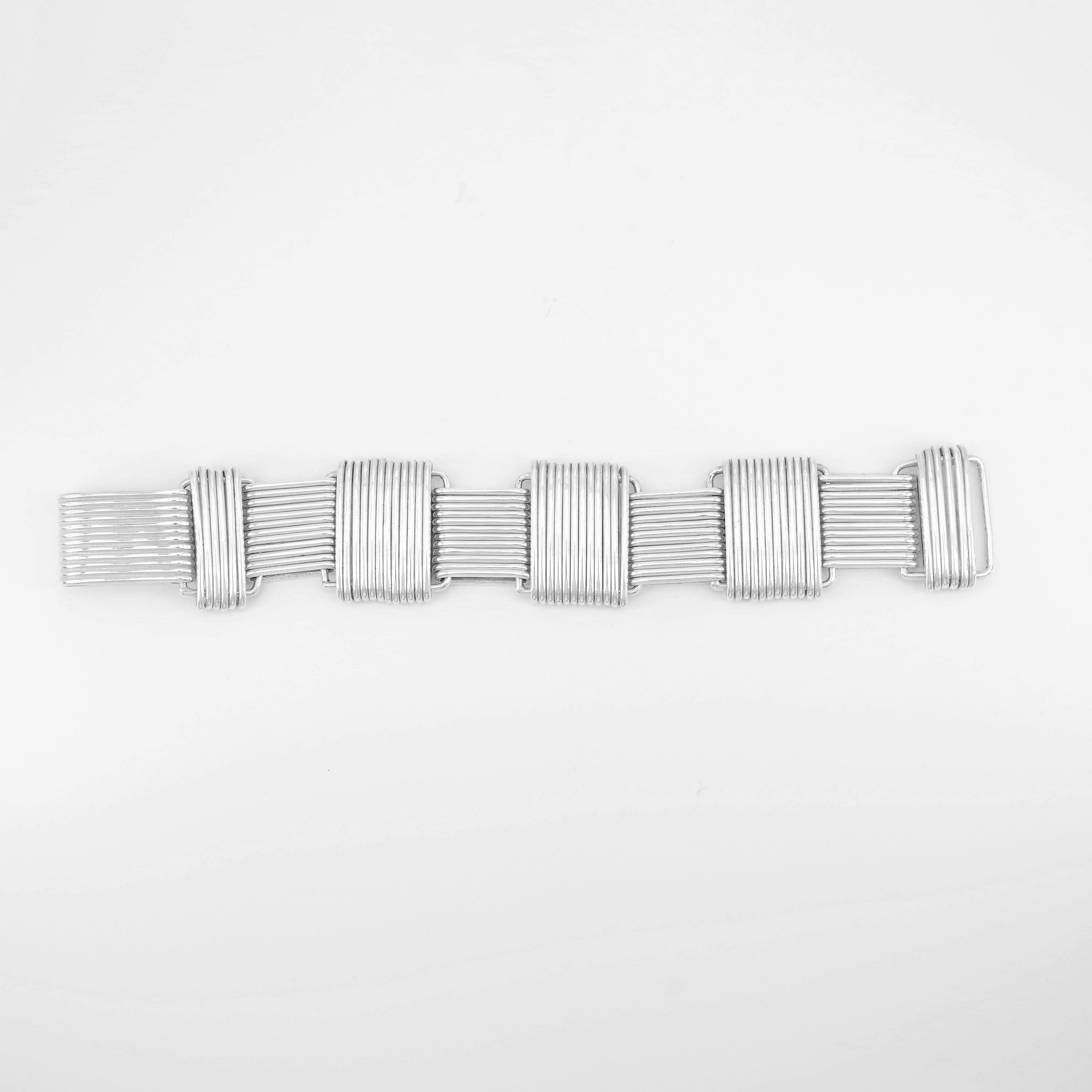 If you have even a slight interest in the jewelry created during the Mexican Modernist movement, this bracelet may well look familiar to you. Hector Aguilar created this bracelet in the 1940s and it has since become an iconic piece from the