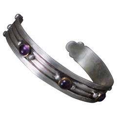 William Spratling Bracelet manchette en argent sterling, laiton et améthyste Taxco, Mexique