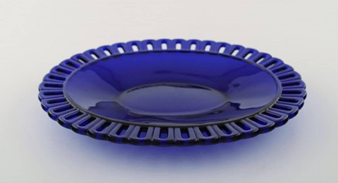 Scandinavian Modern William Steberg for Gullaskuf, Seven Plates and Bowls in Dark Blue Art Glass For Sale