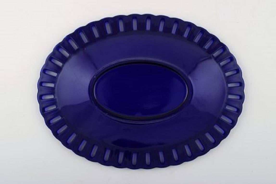 Swedish William Steberg for Gullaskuf, Seven Plates and Bowls in Dark Blue Art Glass For Sale