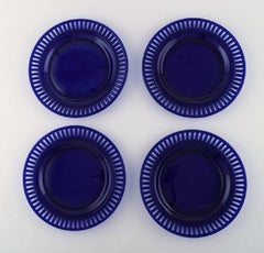 William Steberg for Gullaskuf, Seven Plates and Bowls in Dark Blue Art Glass