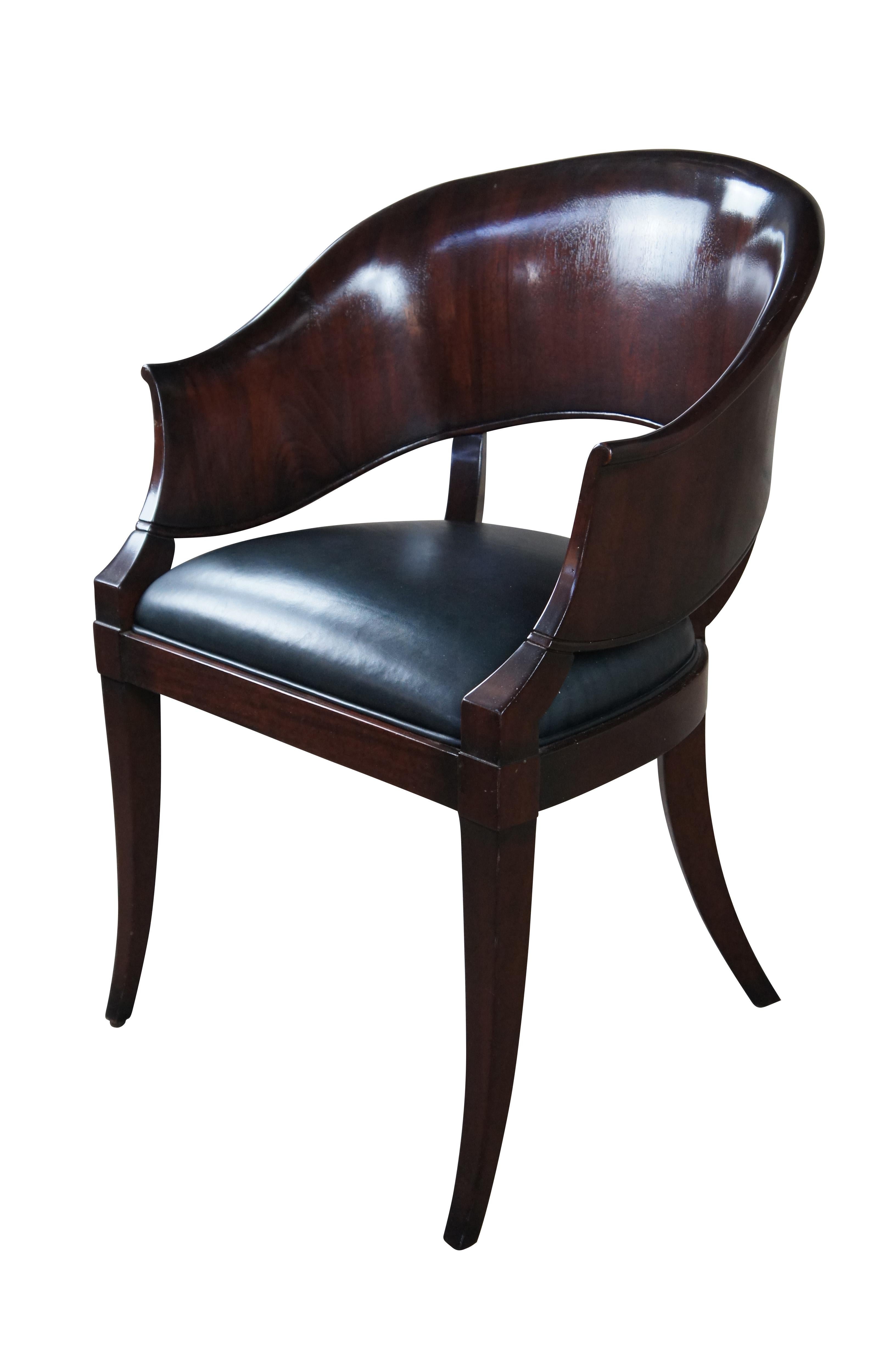 William Switzer Austrian Biedermeier style yoke back Arm Chair.  Made from mahogany with beautiful barrel back and leather upholstered seat.  Features square tapered saber legs.  William Switzer Fine Furniture Made in Canada,