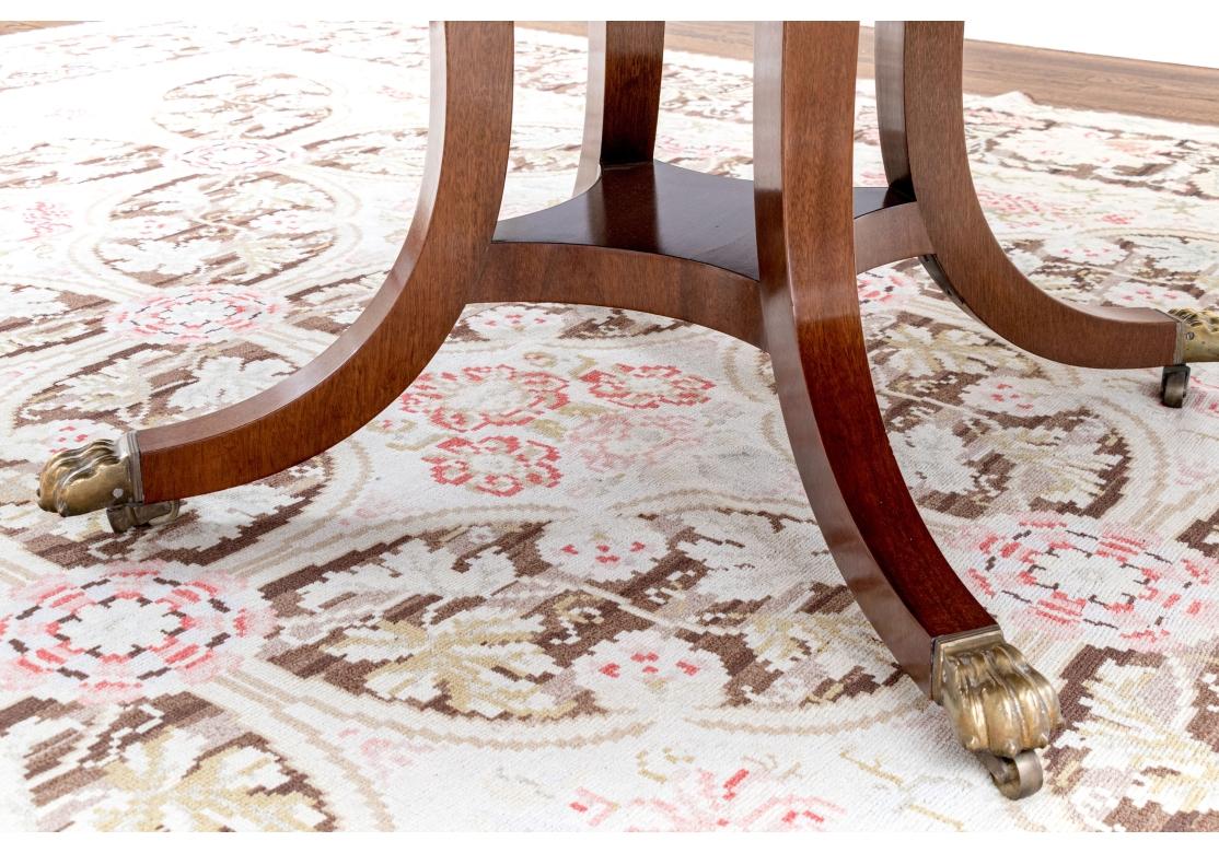 Brass William Tillman Attributed Mahogany Circular Dining Table With Extension Leaves For Sale