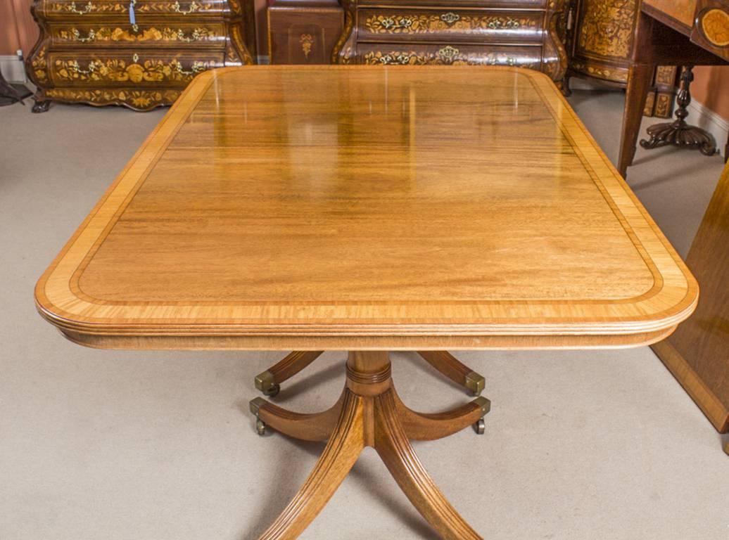 Mahogany William Tillman Regency Dining Table and Ten Hepplewhite Chairs, 20th Century