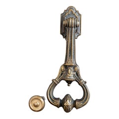 William Tonks & Sons: battente vittoriano in ottone