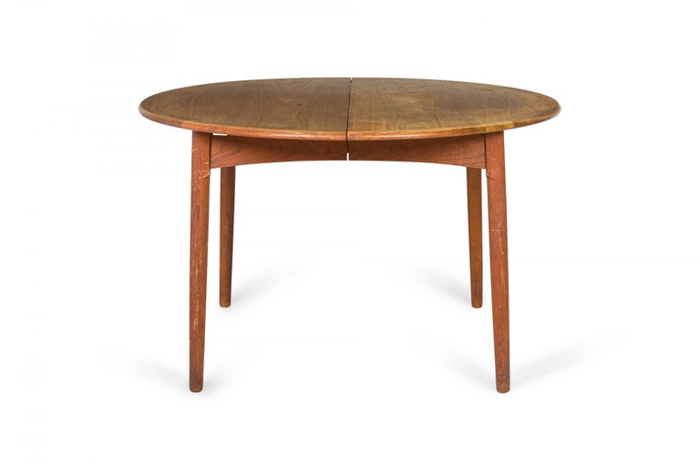 20th Century William Watting Danish Mid-Century Modern Teak Dining Table with Leaves For Sale
