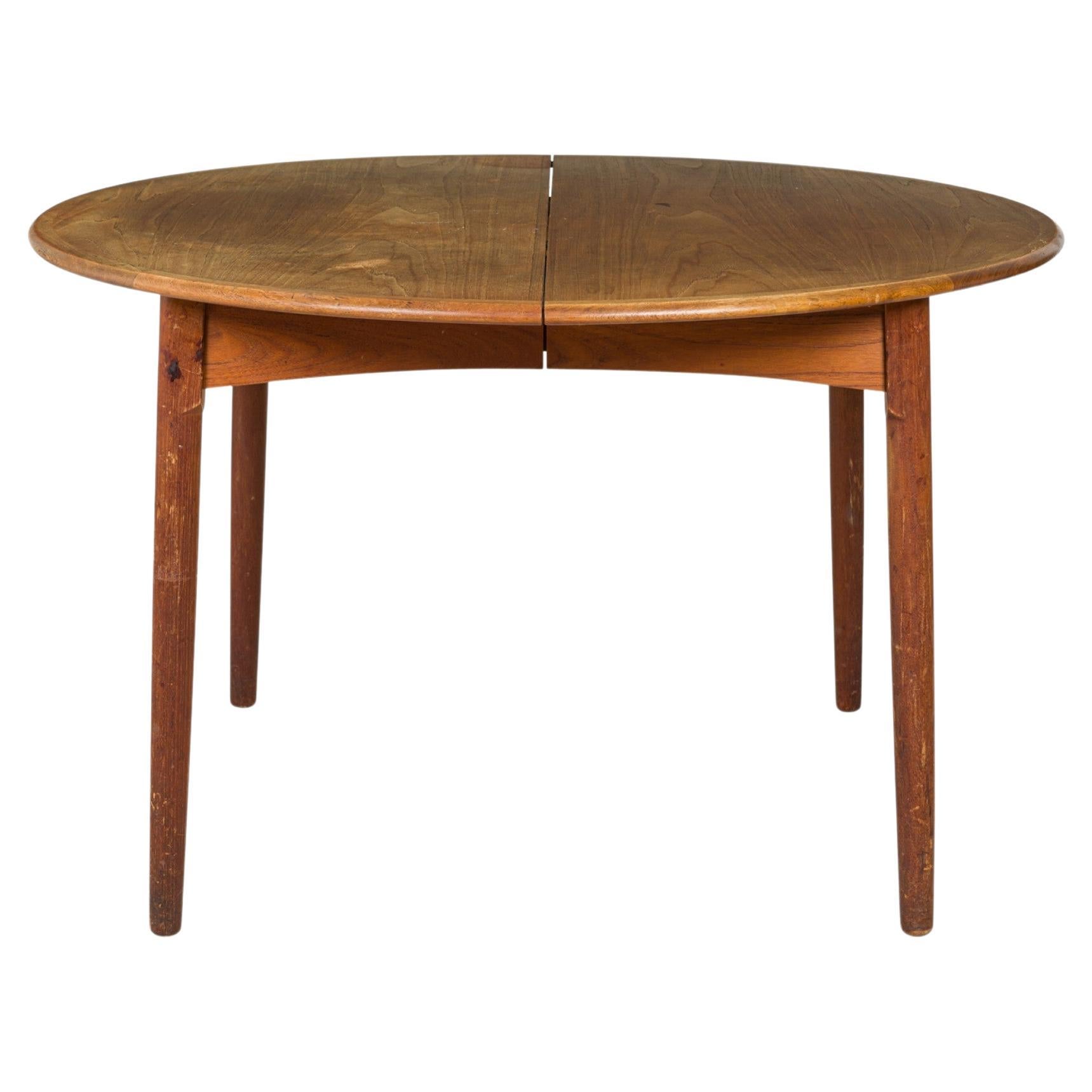 William Watting Table de salle à manger danoise en teck, moderne du milieu du siècle, avec des feuilles. en vente