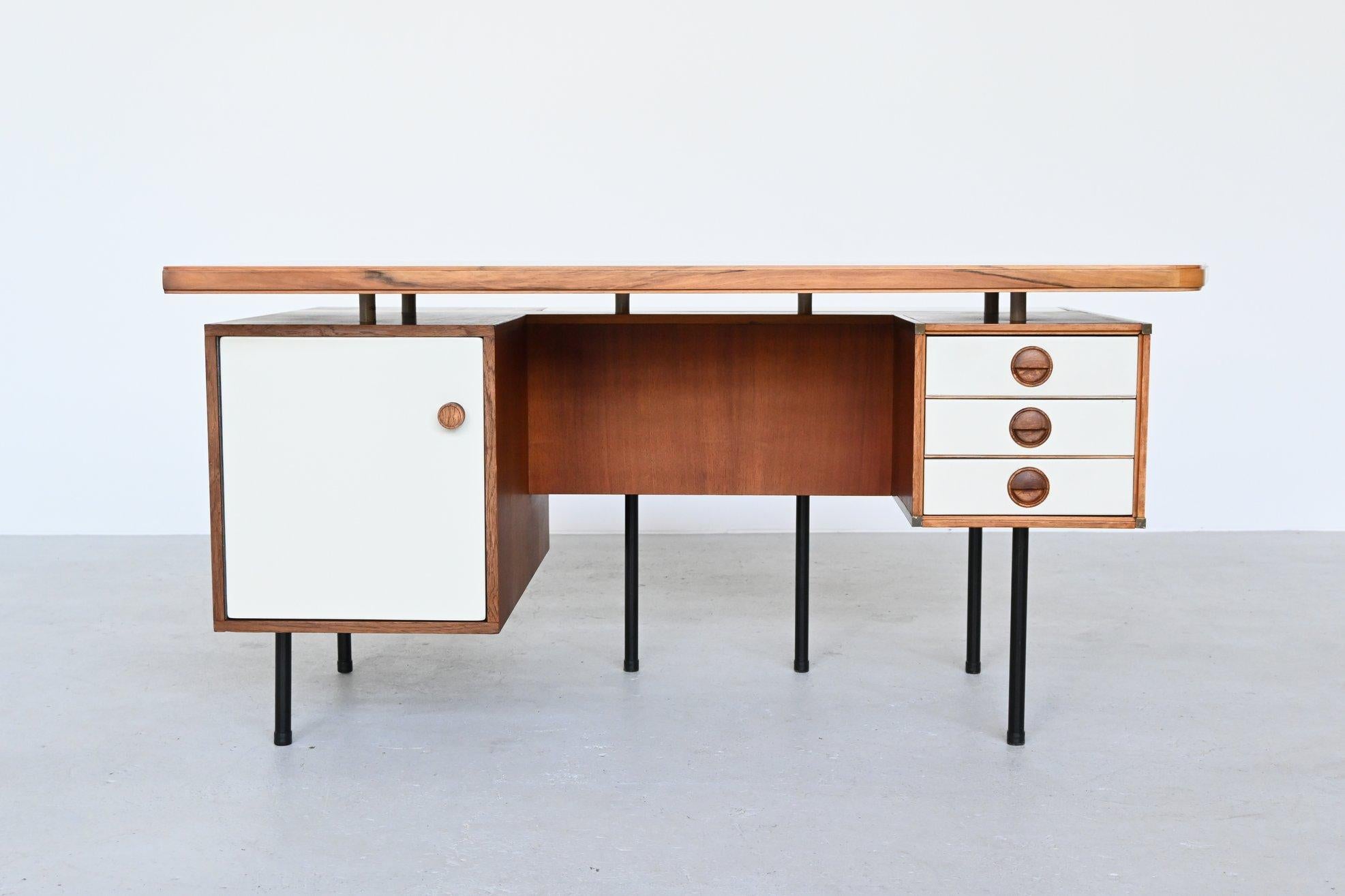 Amazing shaped and unique desk designed by William Watting for Fristho Franeker, The Netherlands, 1960. This desk was custom made for a client in the early 1960s. We bought it together with a very nice lowboard from the same designer.

This