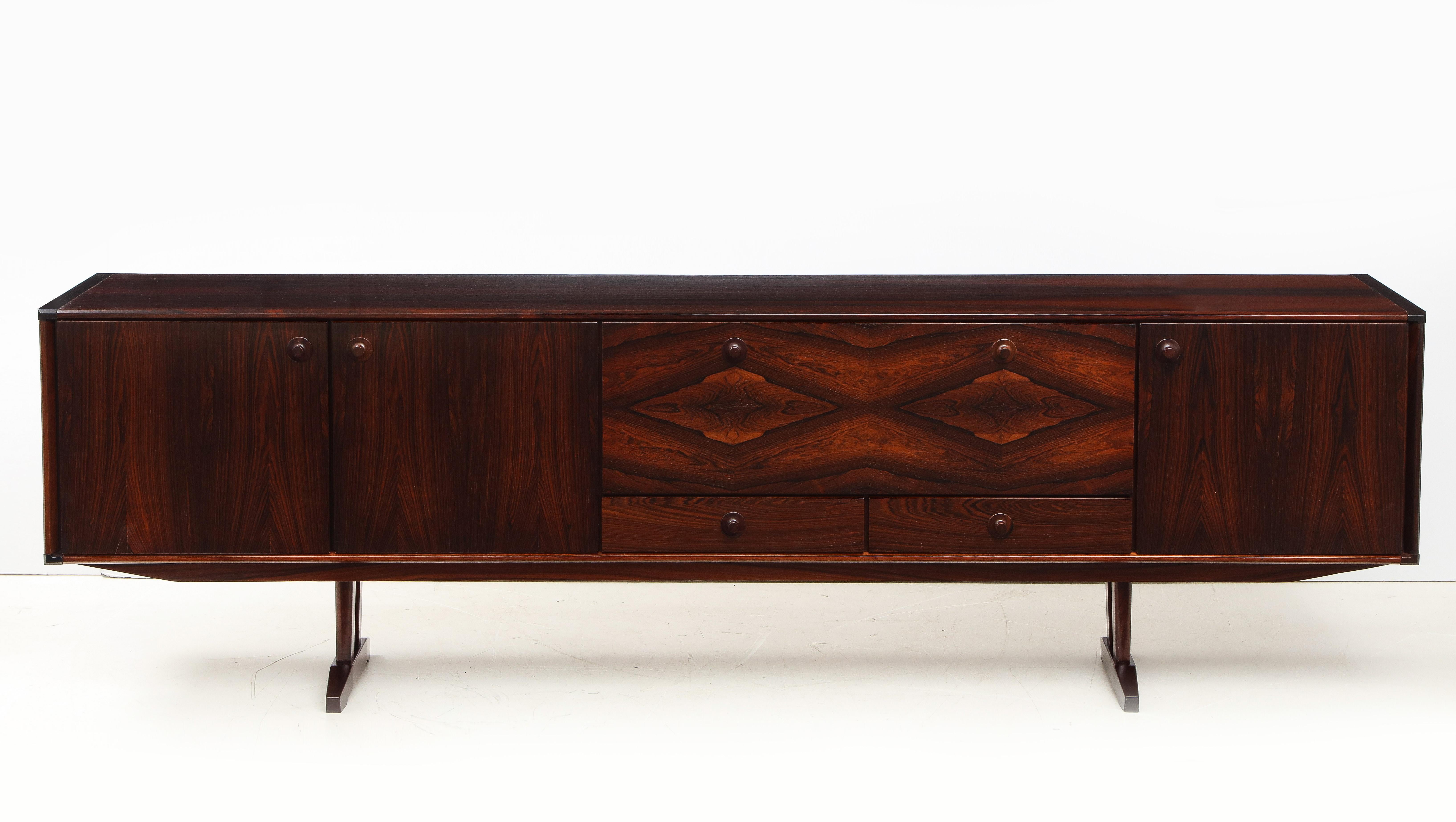 Stunning 1960s modernist long Brazilian rosewood sideboard designed by William Watting for Fristho. Restored with minor wear and patina due to age and use.