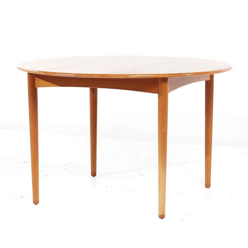 Mid-Century Modern William Watting Style MCM Danish Teak Expanding Dining Table with 2 Leaves For Sale