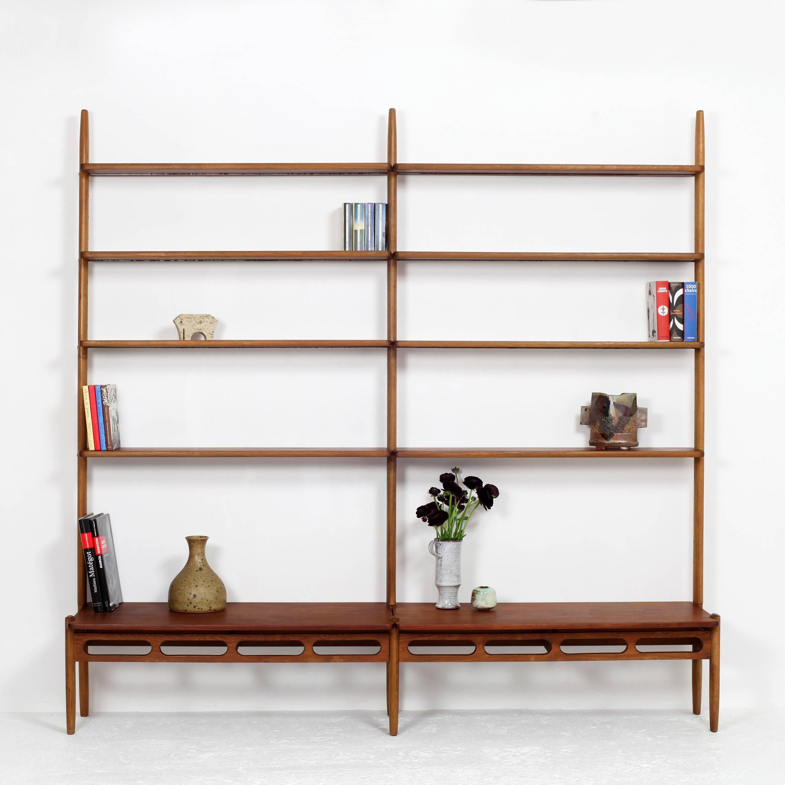 Light and aerial shaped modular bookshelves in teak and oak designed by William Watting for A/S Mikael Laursen, 1950, Denmark.