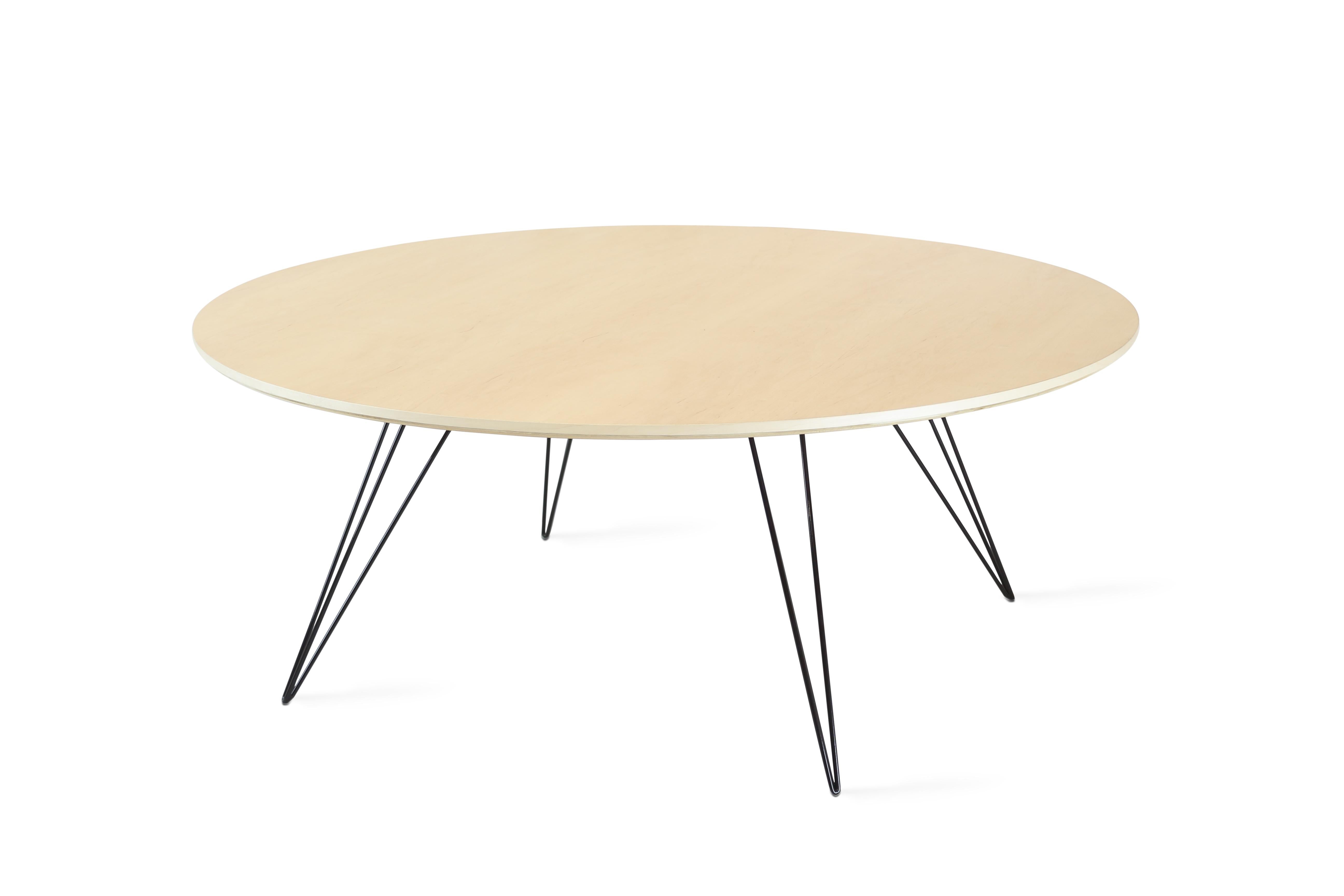 A thin, elegant and light table that can be customized to any shape, size and color desired. This handcrafted item perfectly blends industrial hairpin legs with a beveled wooden top. The irregular beauty of its natural wood combined with its simple