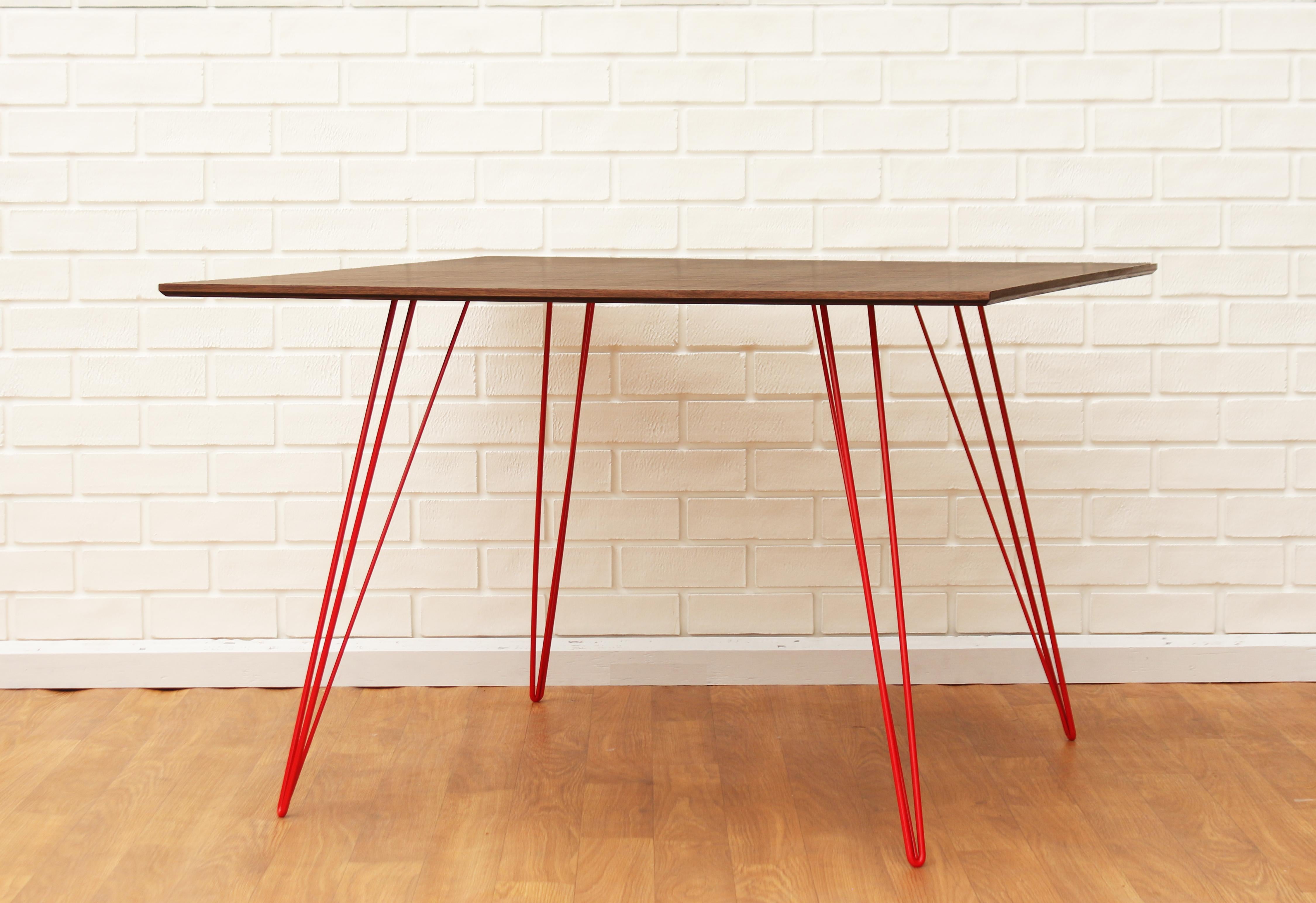 A thin, elegant and light table that can be customized to any shape, size and color desired. This handcrafted item perfectly blends industrial hairpin legs with a beveled wooden top. The irregular beauty of its natural wood combined with its simple