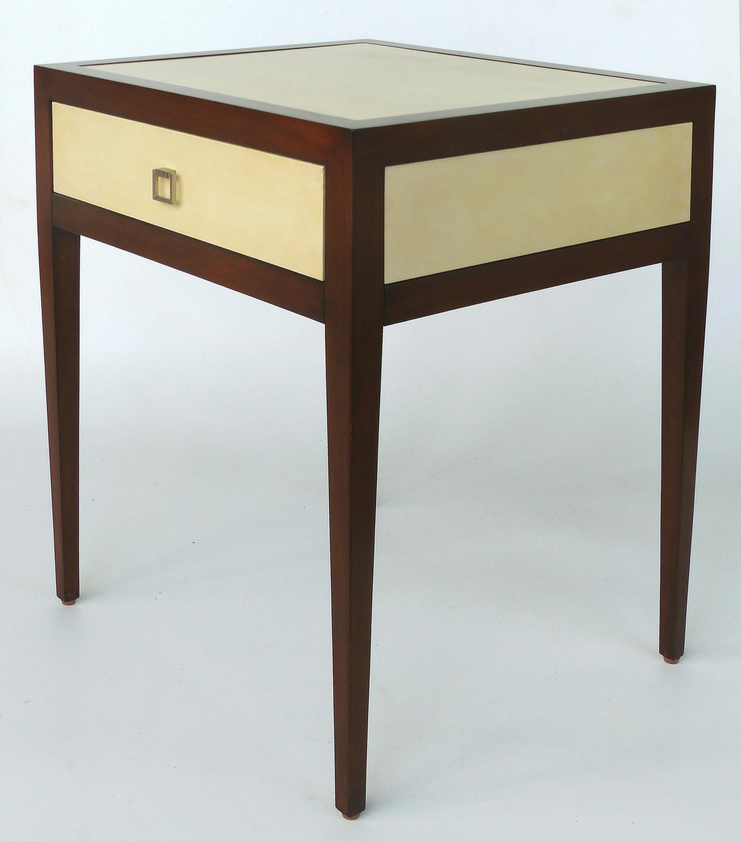 Williams and Sonoma Home Mahogany and Parchment Side Table

Offered for sale is a Williams and Sonoma Home mahogany and parchment side table. The table has inset parchment panels on all side and on the top. It has a single drawer with chrome