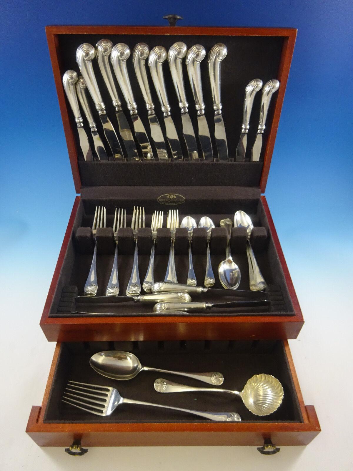 The Williamsburg Shell pattern is best known for its substantial pistol-grip knife, and the classic colonial shell design on the handle. 
Williamsburg Shell by Stieff Dinner Size sterling silver flatware set - 51 pieces. This set includes:



8