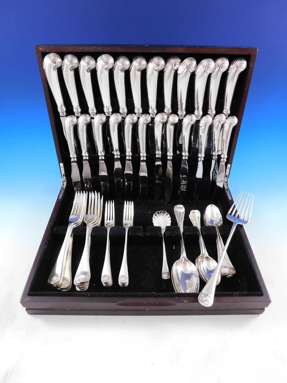 Dinner size Williamsburg shell by Stieff Sterling silver flatware set - 64 pieces. This set includes:

The popular Williamsburg Shell pattern is best known for its substantial pistol-grip knife, and the classic colonial shell design on the