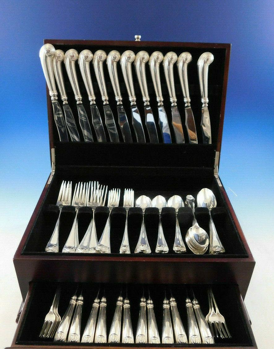 Dinner Size Williamsburg Shell by Stieff Sterling Silver Flatware set - 84 pieces. This set includes:

The popular Williamsburg Shell pattern is best known for its substantial pistol-grip knife, and the classic colonial shell design on the