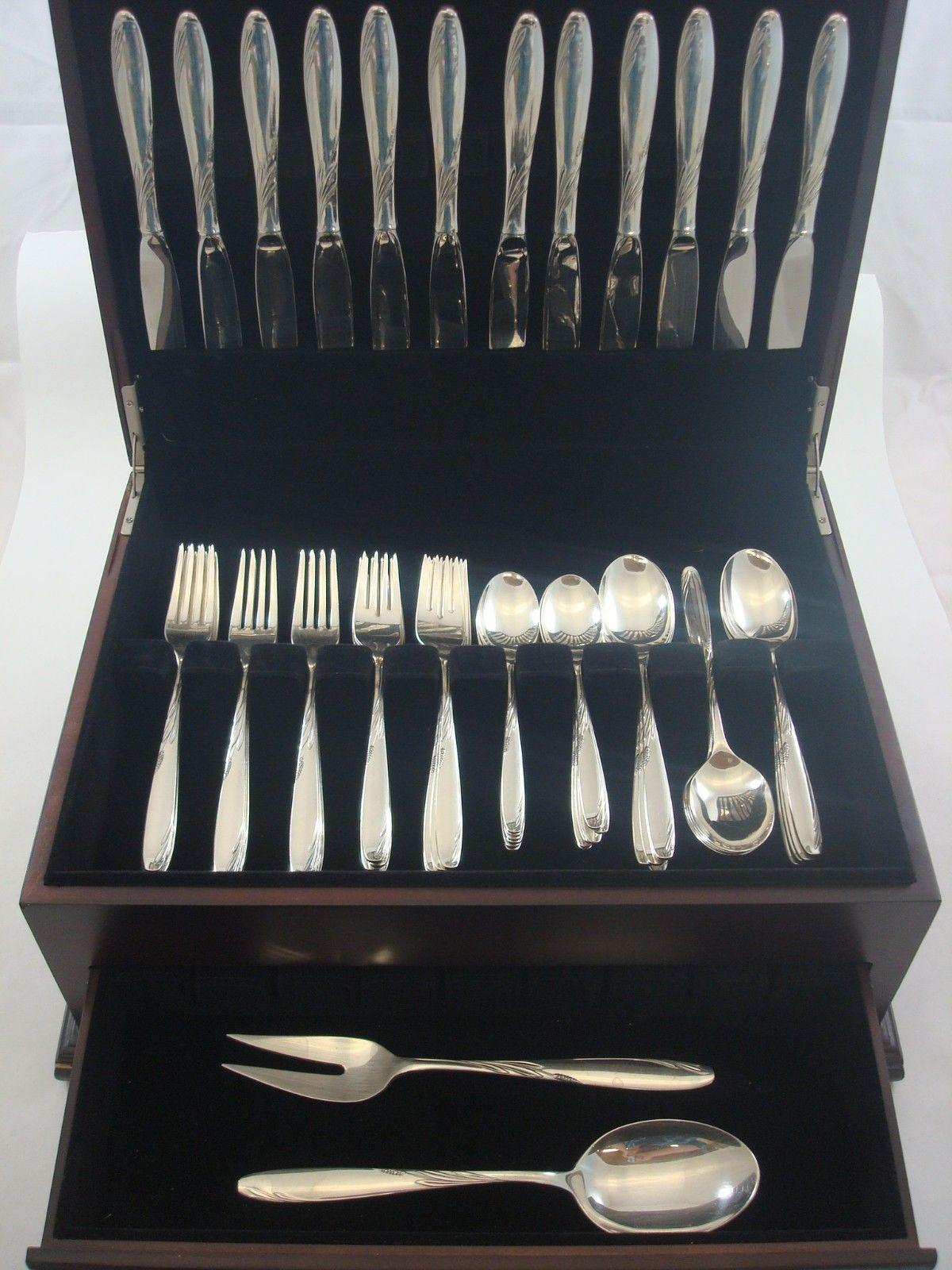 Mid-Century Modern Willow by Gorham sterling silver circa 1954 flatware set of 62 pieces. This set includes:

12 knives, 9 1/4