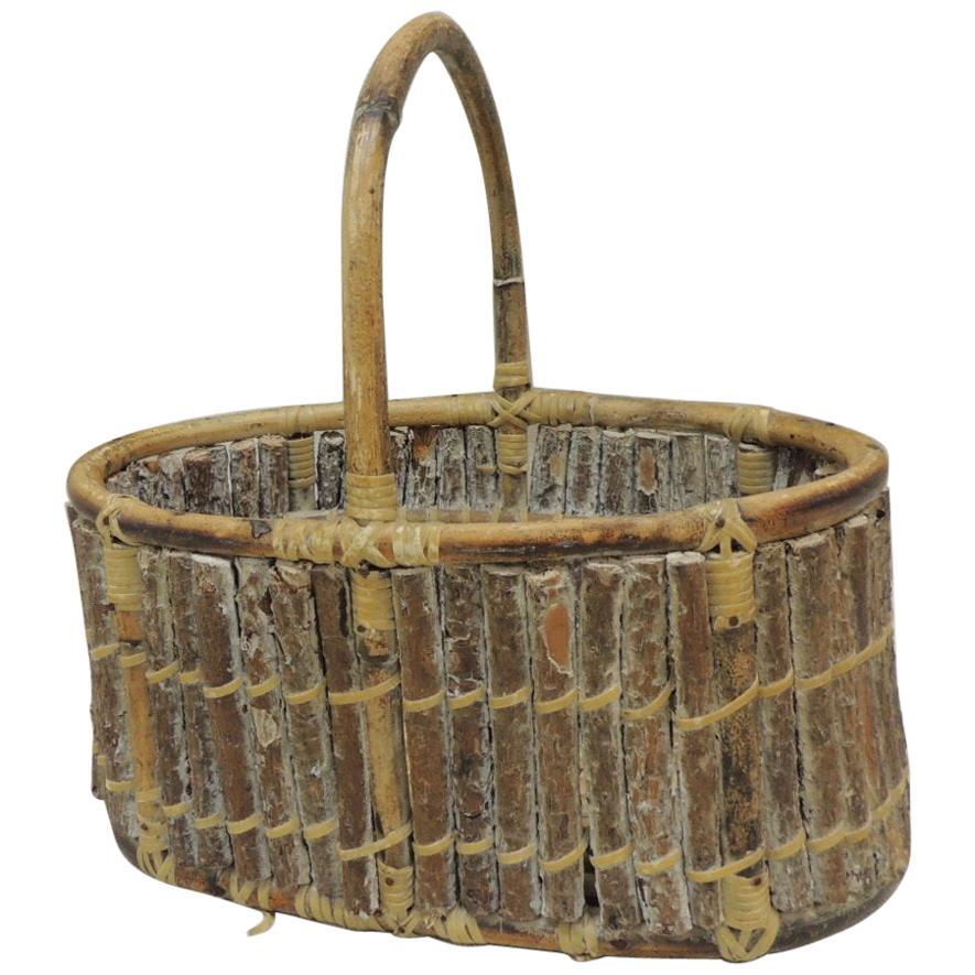 Willow Oval Decorative Basket with Handle at 1stDibs