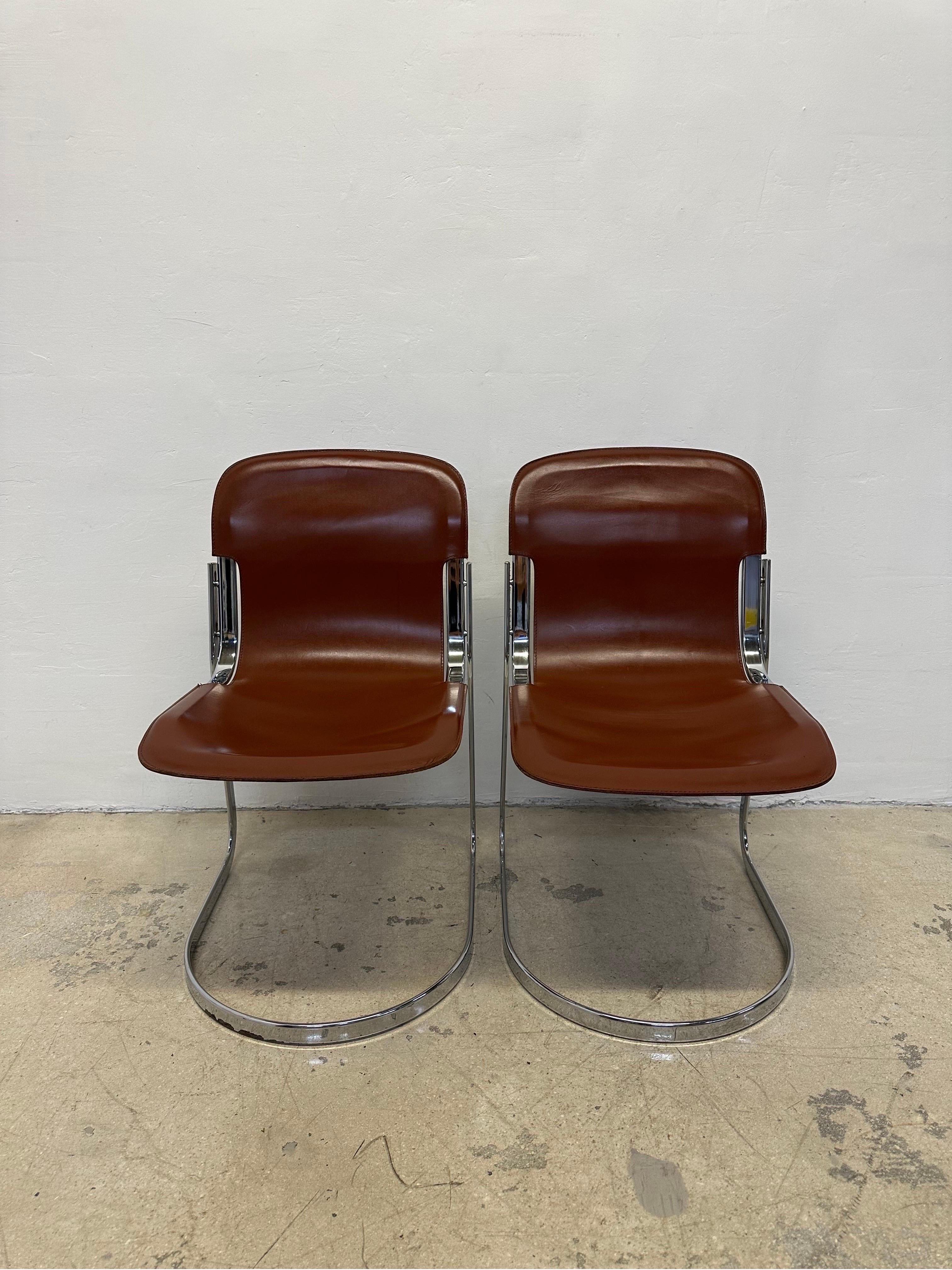 C2 leather and chrome cantilevered dining or side chairs designed by Willy Rizzo for Cidue, Italy 1970s.

Priced individually 