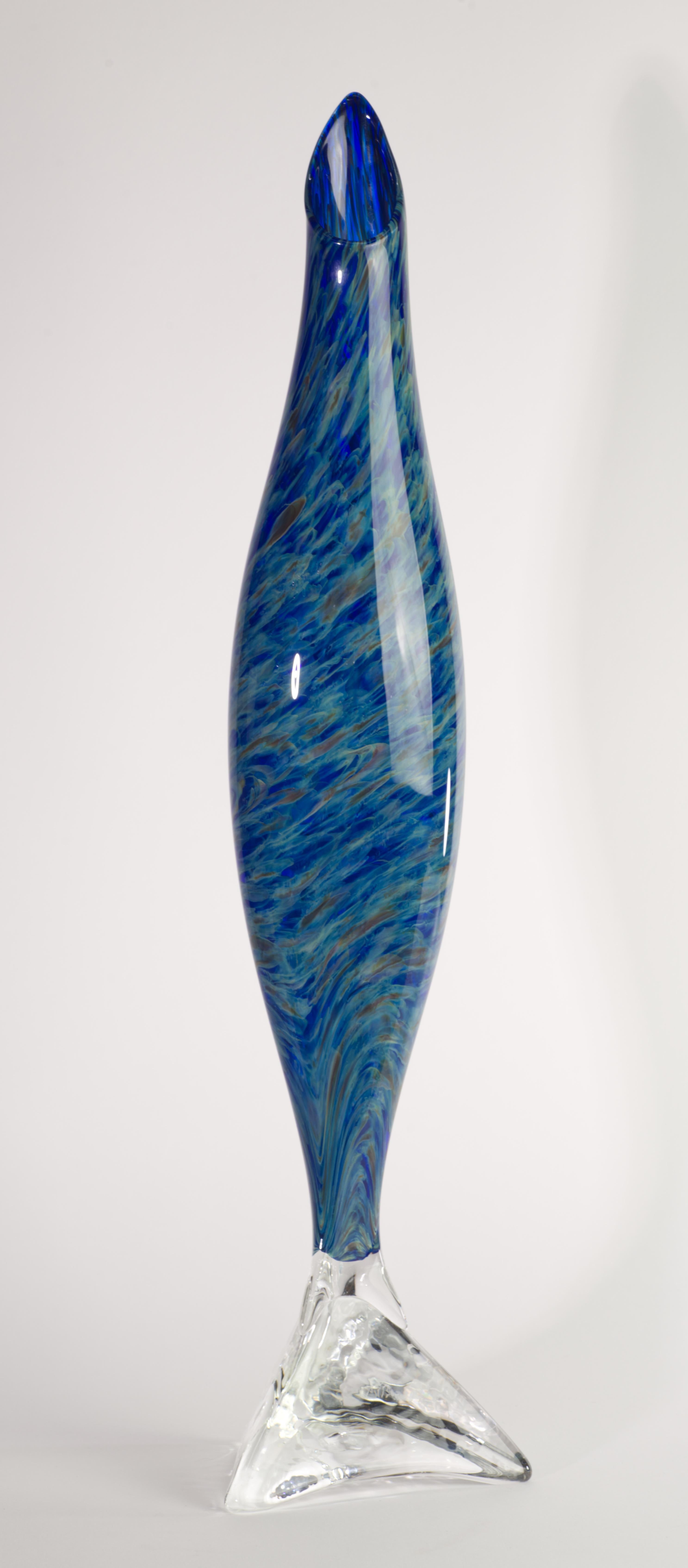  Blue Fish vessel or vase was created by Paul Willsea and Carol O'Brien as a part of series that consists of bowls and vases which combine a blown vessel with a cast base. The base is cast to give the pieces a stable foundation while drawing