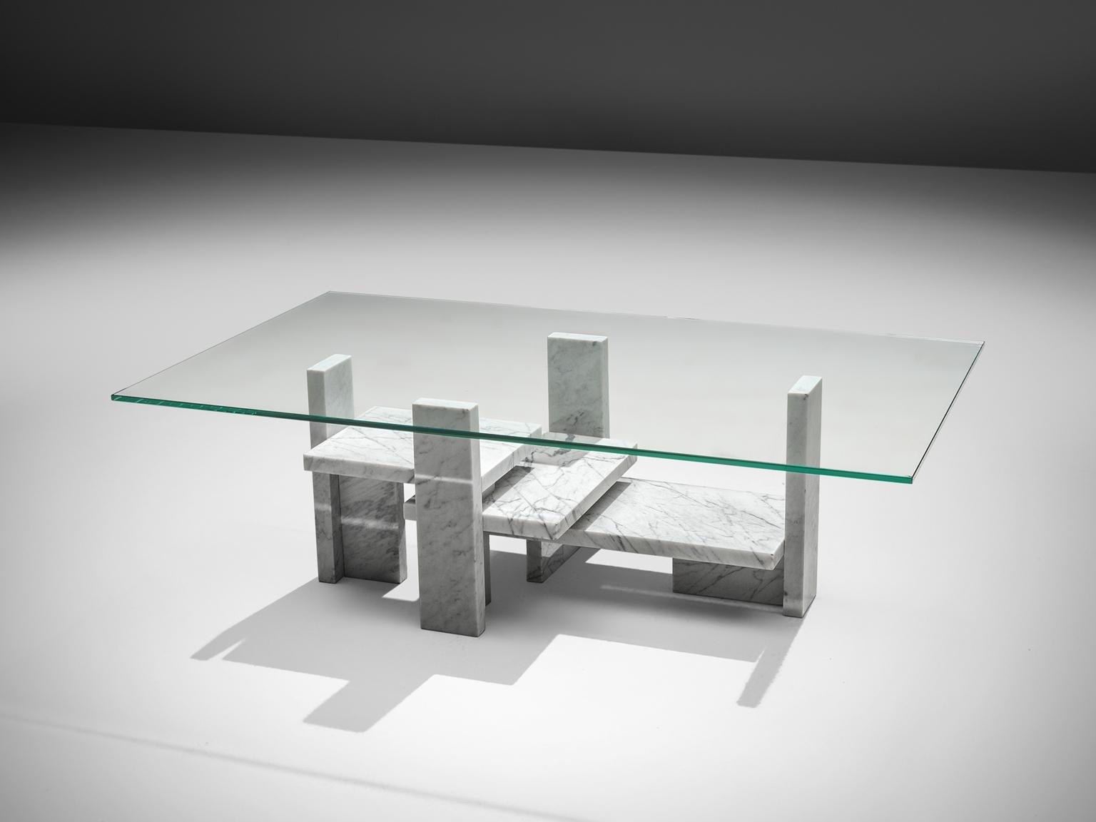Willy Ballez, coffee table, marble, glass, Belgium, 1970. 

This sculptural table is a skilful example of postmodern design by the Belgian designer Willy Ballez. The glass and marble table is architectural in its design is it is built up of