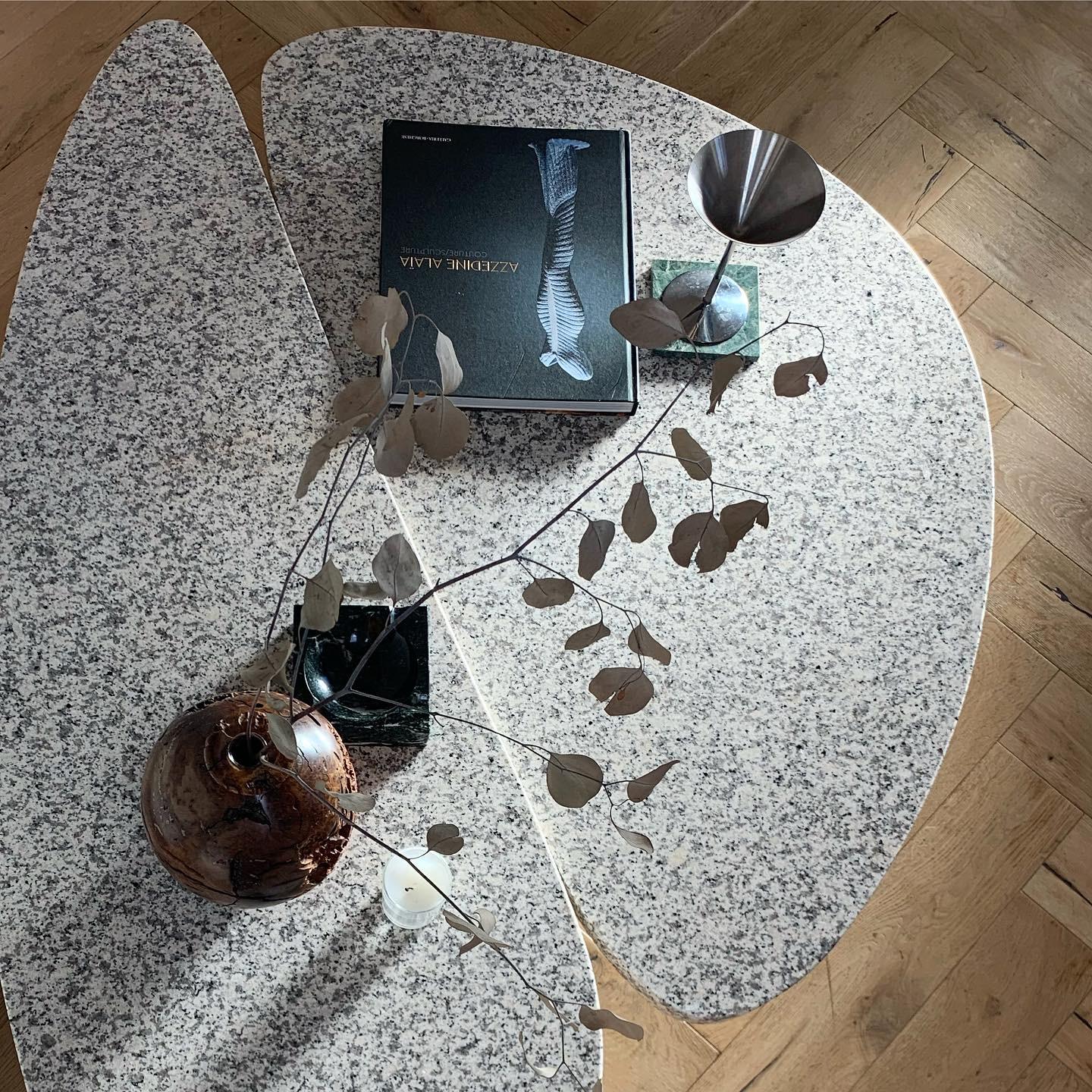 For the savvy collector: ultra rare 1970s architectural granite coffee table by Willy Ballez, circa 1975. Ballez was a Belgium designer/artist who crafted exquisite postmodern marble furnitures throughout the 1970s. His petal pieces, carved out of