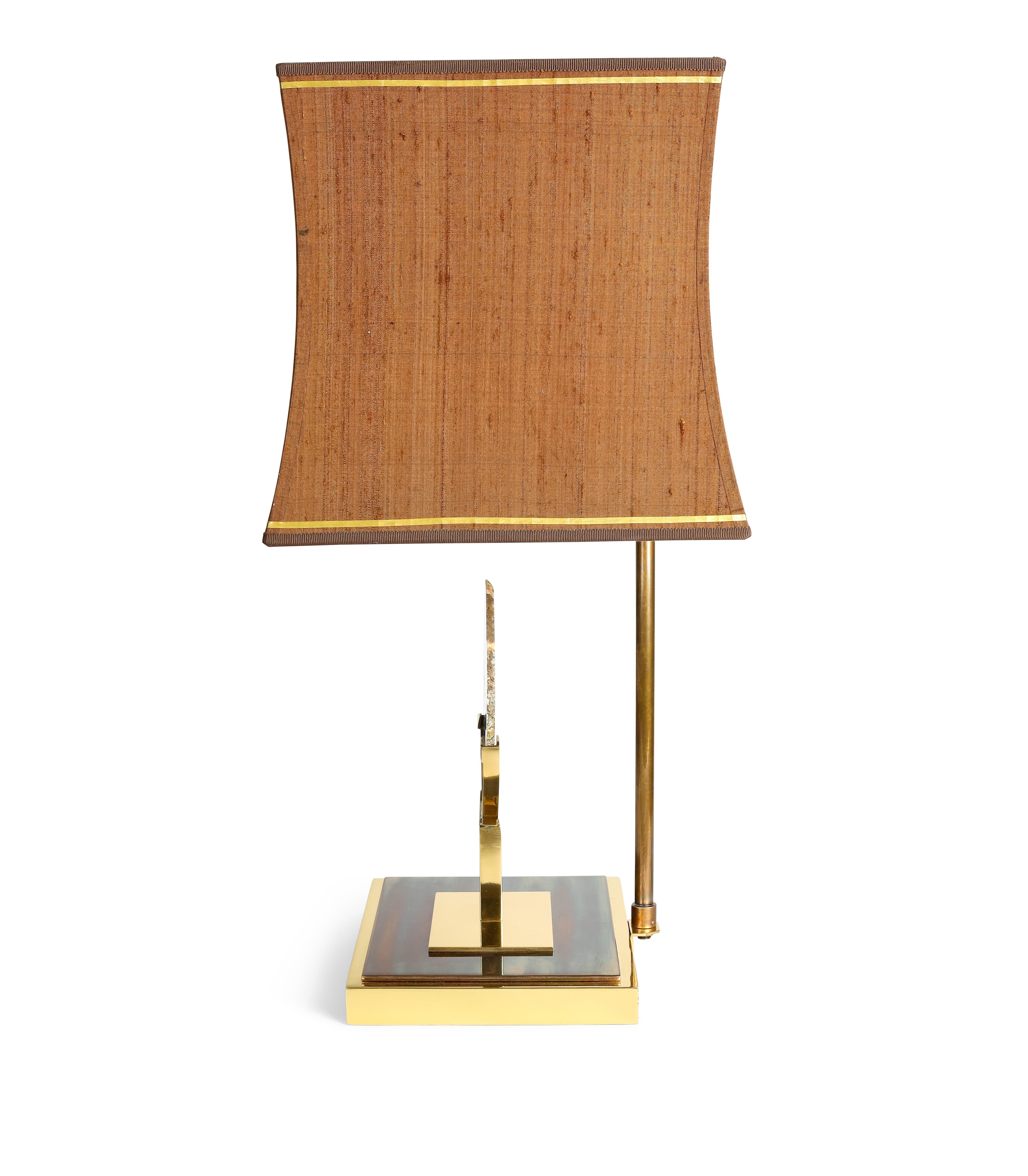This lamp is in brass with a 2 tone base. It has been professionally refinished. It holds an agate stone. The shade was hand made with a gold trim. The lamp has been American wired and has 2 lights.                                   Size of the