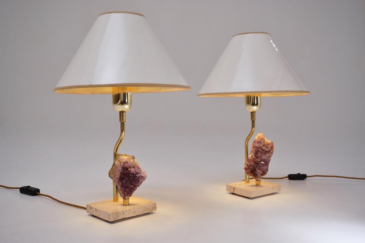 Willy Daro lamps, a matching pair in the Brutalist style with brass frames holding amethyst crystals, circa 1970s, Belgium.

These table lamps have been gently cleaned while respecting the vintage patina. Both are newly rewired, earthed, fully