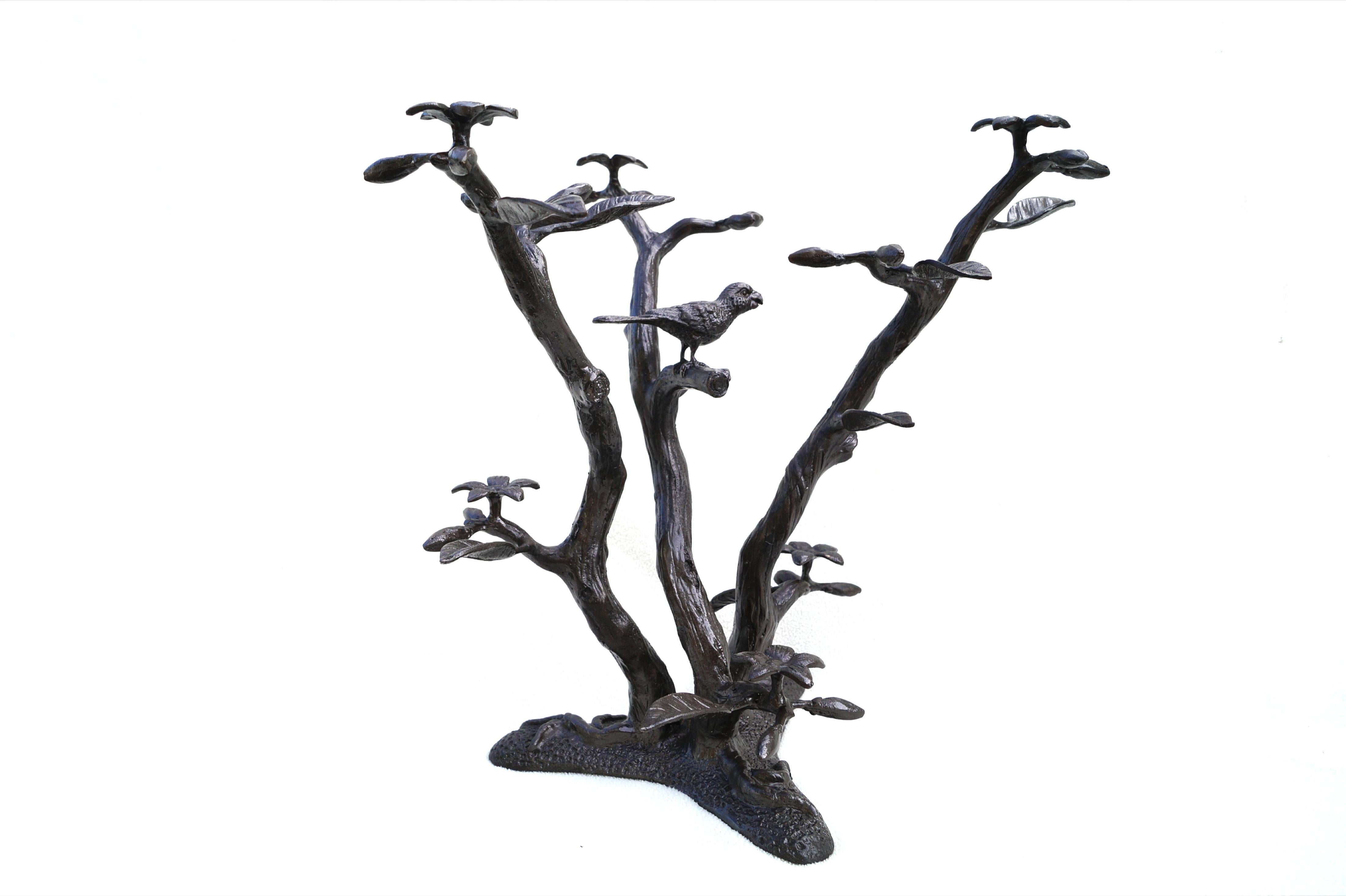 This is a stunning vintage metal end table base featuring an intricate bird, flowers , and tree base. You may use you own glass, marble, wood , etc top. It originally had a 22
