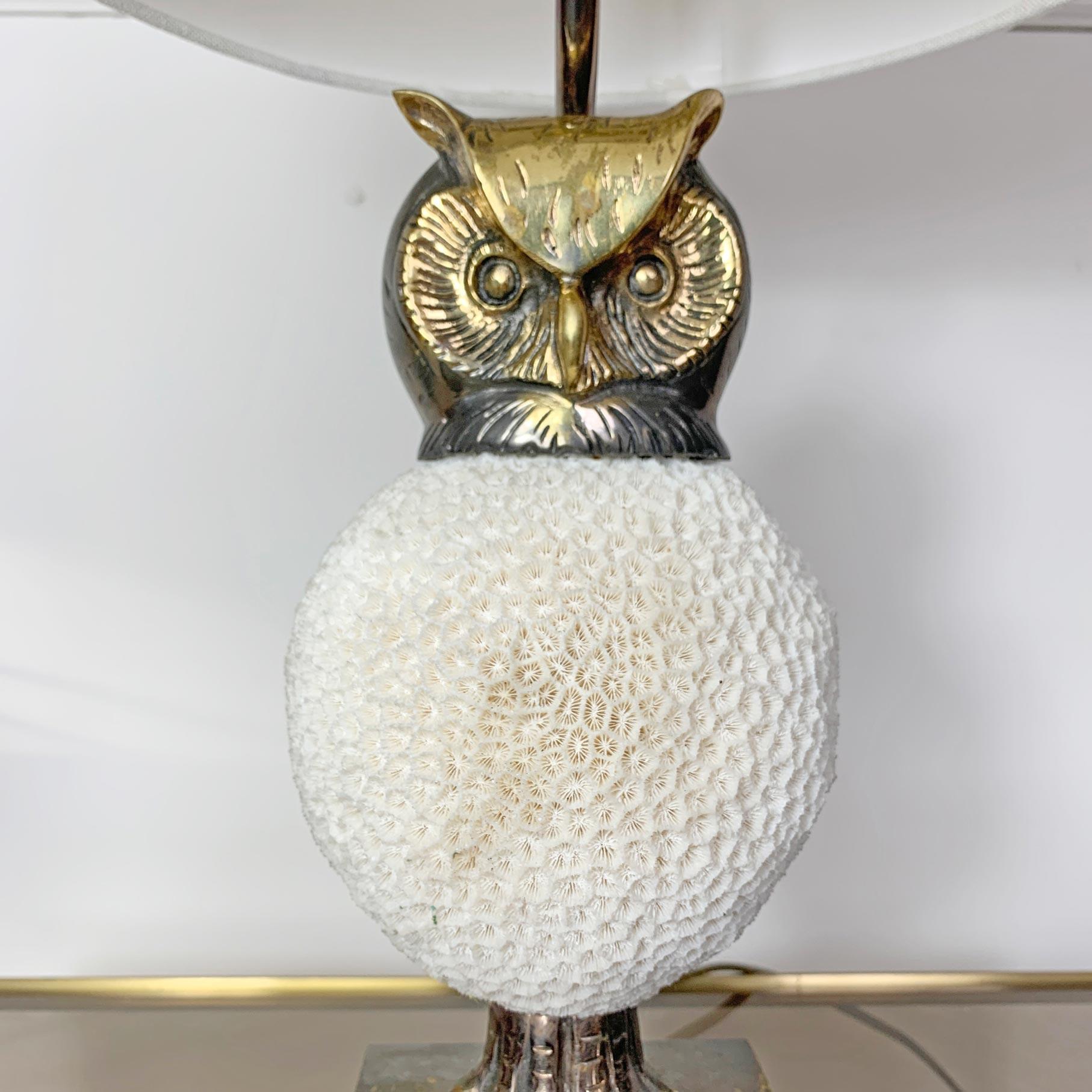 The coral owl lamp is an exceptionally rare and important piece of work made and signed by the pioneering Belgian artist Willy Daro
Dating from the 1970s
Comprising a body made from a single piece of natural coral with worked brass head and base
The