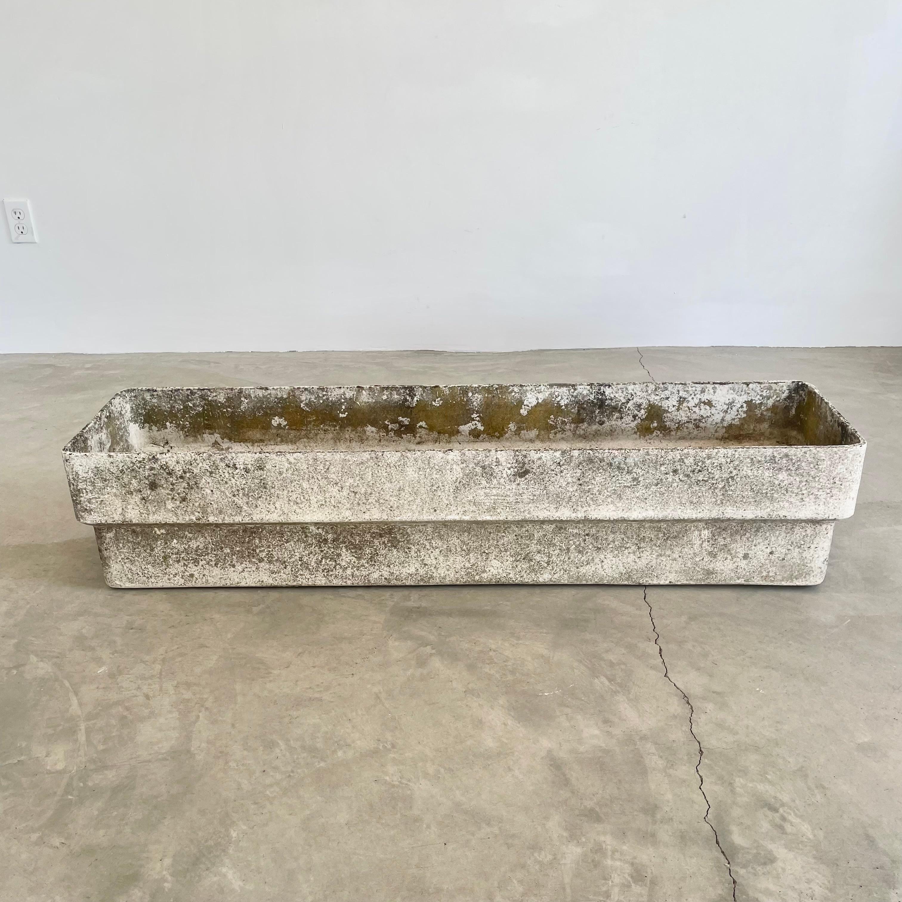 Rare and unique large trough planters by Swiss architect and industrial design pioneer Willy Guhl for Eternit, Switzerland circa 1960s. All are in a white and aged paint with perfect patina. A subtle ridge is cast around the body of each planter