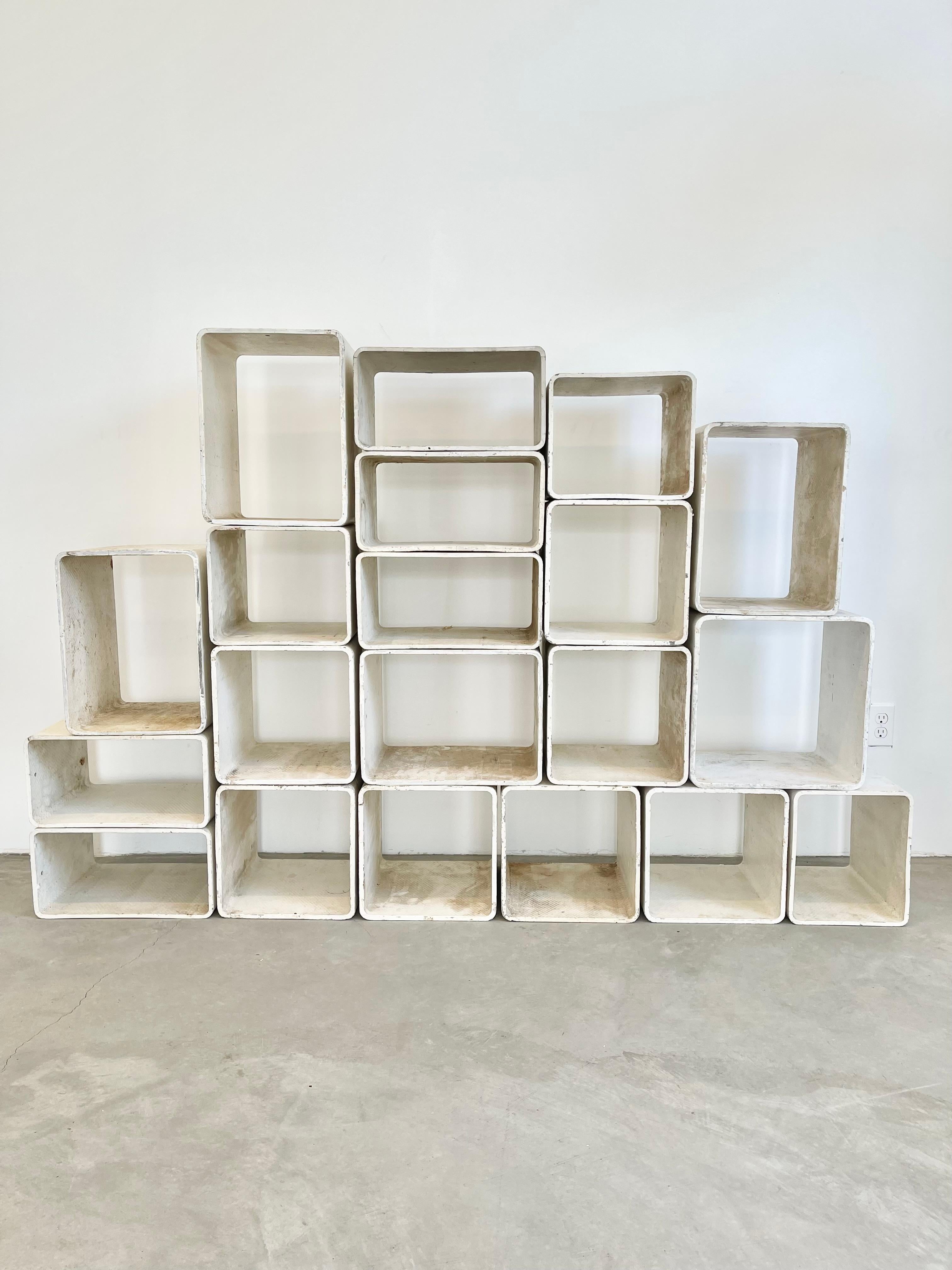 Stunning sculptural set of painted concrete cubes by Swiss architect Willy Guhl. Handmade in the early 1960s in Switzerland and all painted in a soft cream color. Produced by Eternit. Can be arranged in a multitude of ways. Perfect bookcase, room