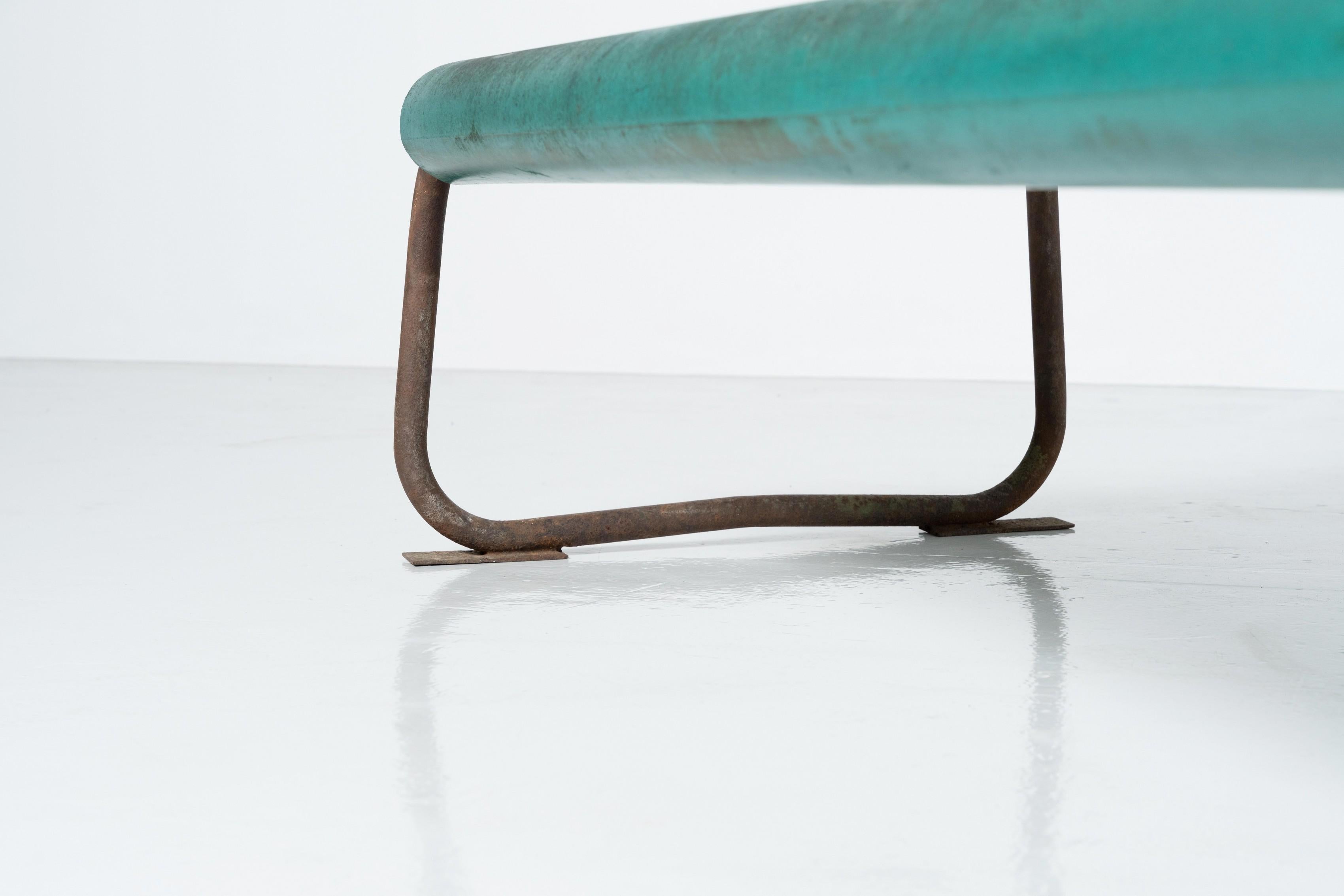 This is a remarkable midcentury floating bench designed by Swiss Architect Willy Guhl. Switzerland, circa 1960. Willy Guhl was well known for its minimal designs which is clearly visible in the design of this bench. The green seat is made
