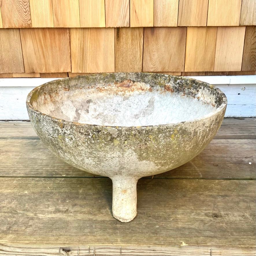 Fantastic concrete planter by Willy Guhl for Eternit. Made in the shape of a cauldron. Beautiful patina throughout with modulating shades of green, white, and orange lichen. Three feet with bowl on top.

Available at our Hamptons location.



   