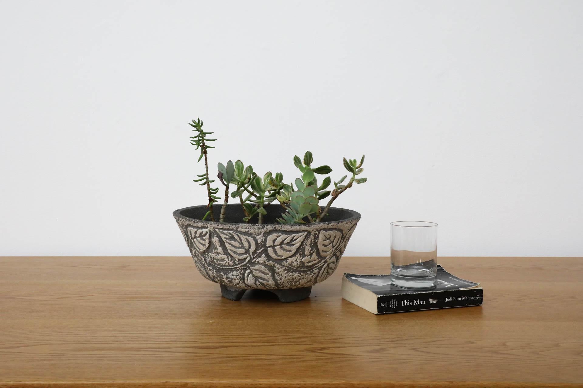 Willy Guhl style, Mid-Century, brutalist-sculpted cast cement bowl planter from France, handsomely decorated with ivy pattern. In original condition with some age-appropriate signs of wear. More cement planter bowls available, listed separately.