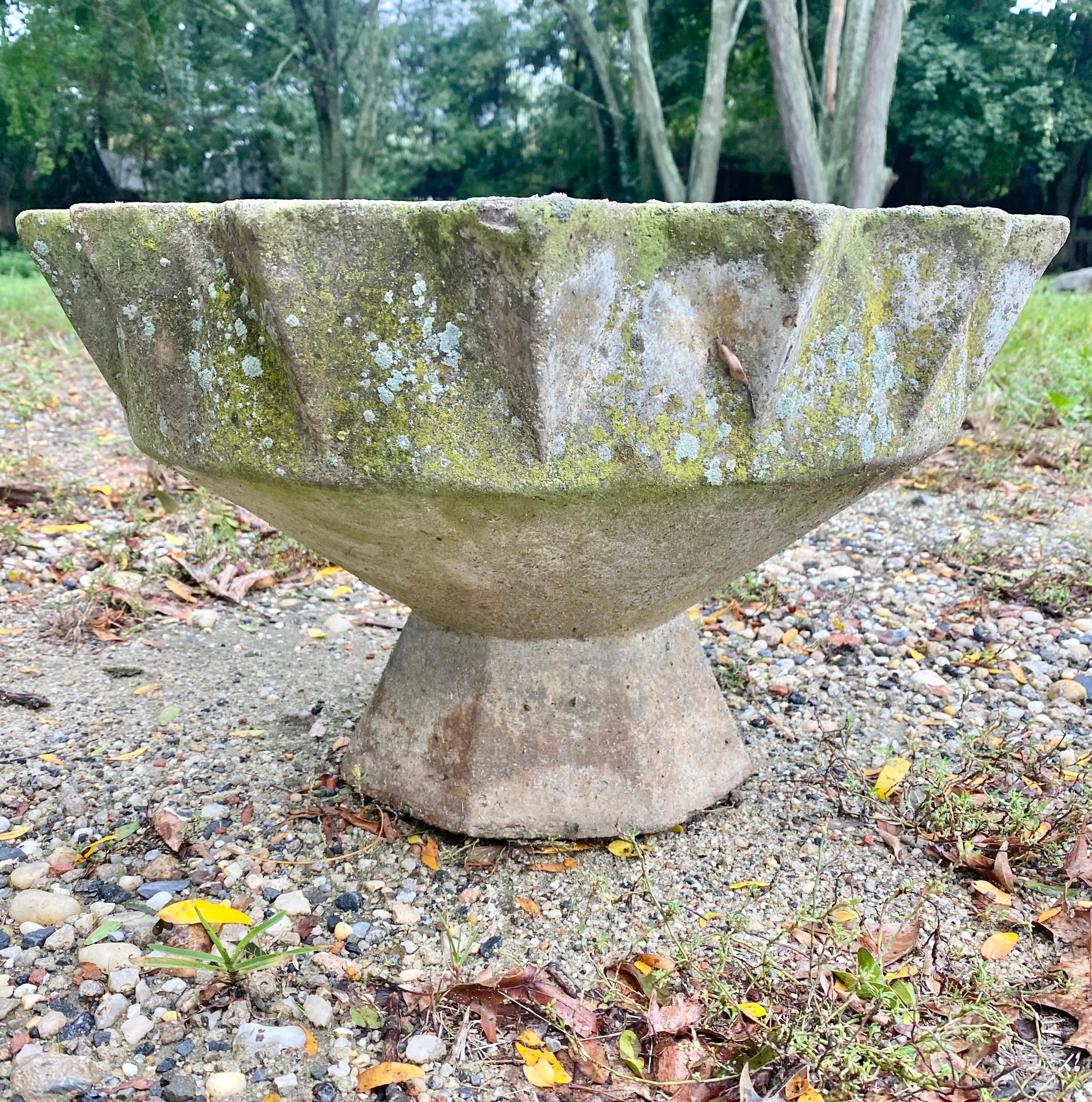 Unique concrete planter by Swiss architect Willy Guhl. Planter in the shape of a chalice. Gorgeous patinas and lichen on these planters. Great vintage condition. 3 available as shown in this listing. Priced individually. Description below matching