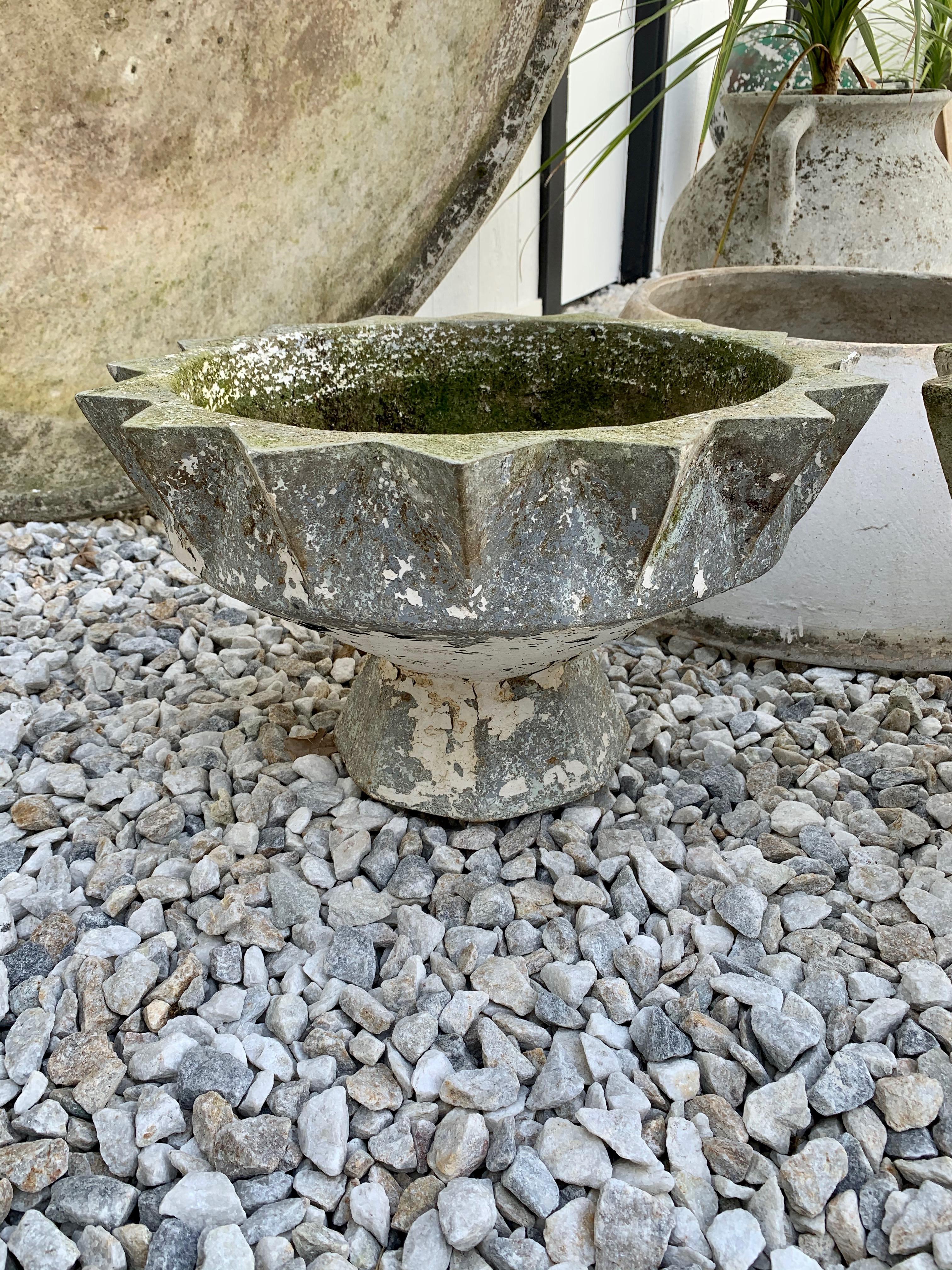 Very unique concrete planters by Swiss architect Willy Guhl. Planters in the shape of a chalice, with a faceted rim and base. Extremely rare. Great condition. Two available. Priced individually.








        