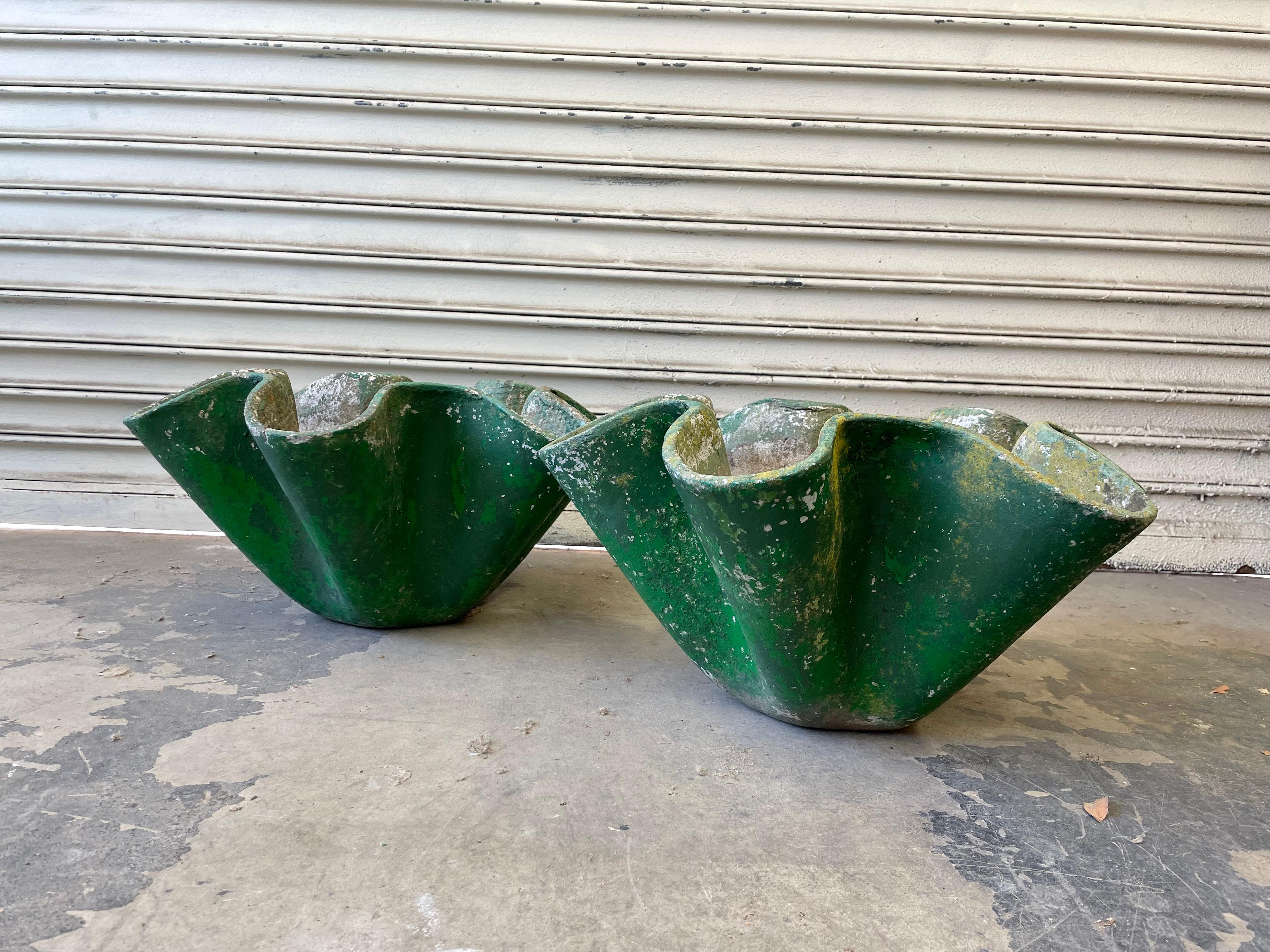 Sculptural biomorphic cement clam planters by Willy Guhl. In the shape of a clam shell. Gorgeous planter for indoors or outside. Excellent patina. 3 available. Priced individually. 

      
 

