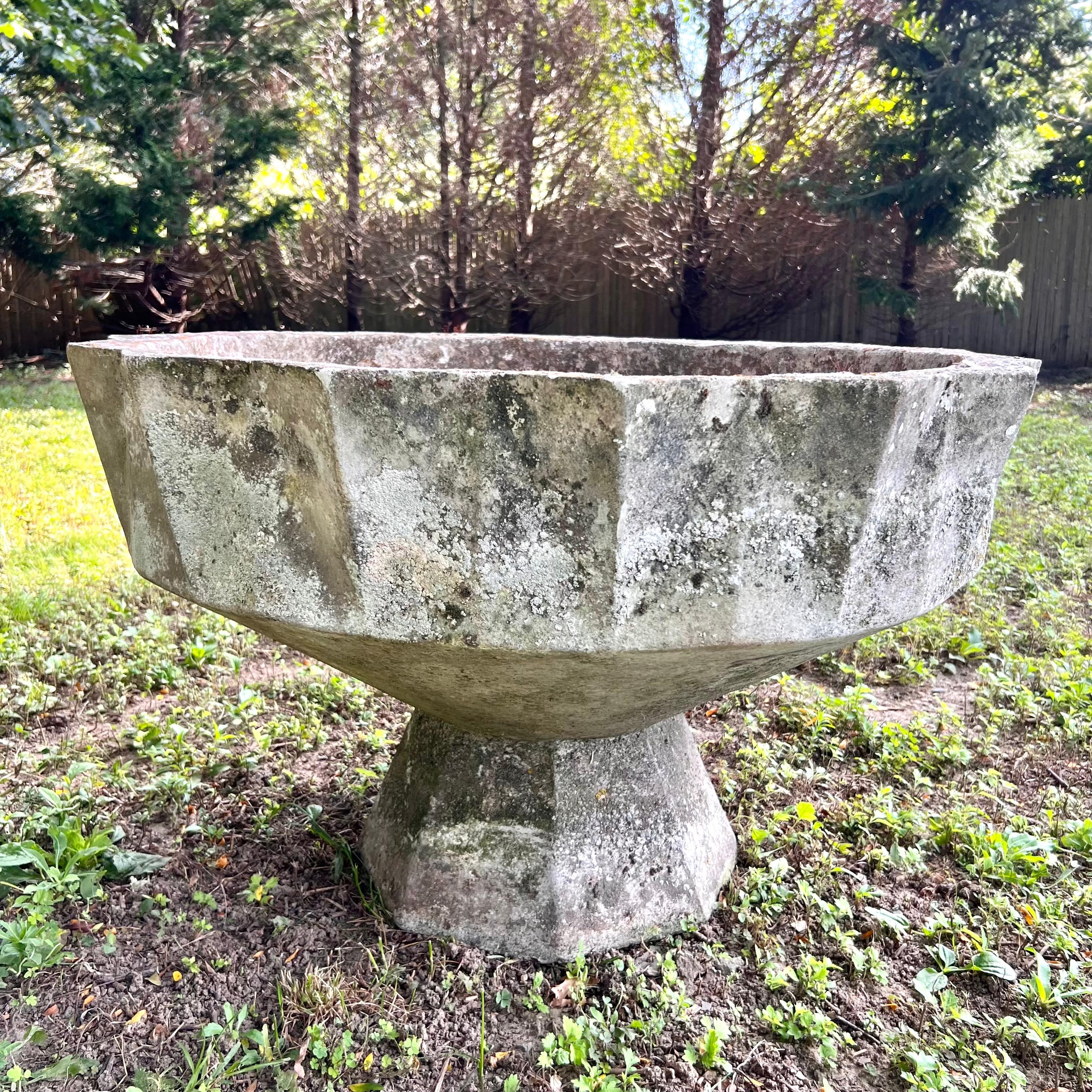 Unique concrete planter by Swiss architect Willy Guhl. Planter in the shape of a chalice with faceted edges along the top and bottom. Great age and patina from decades of European winters. Massive, rare size. Good vintage condition. One other
