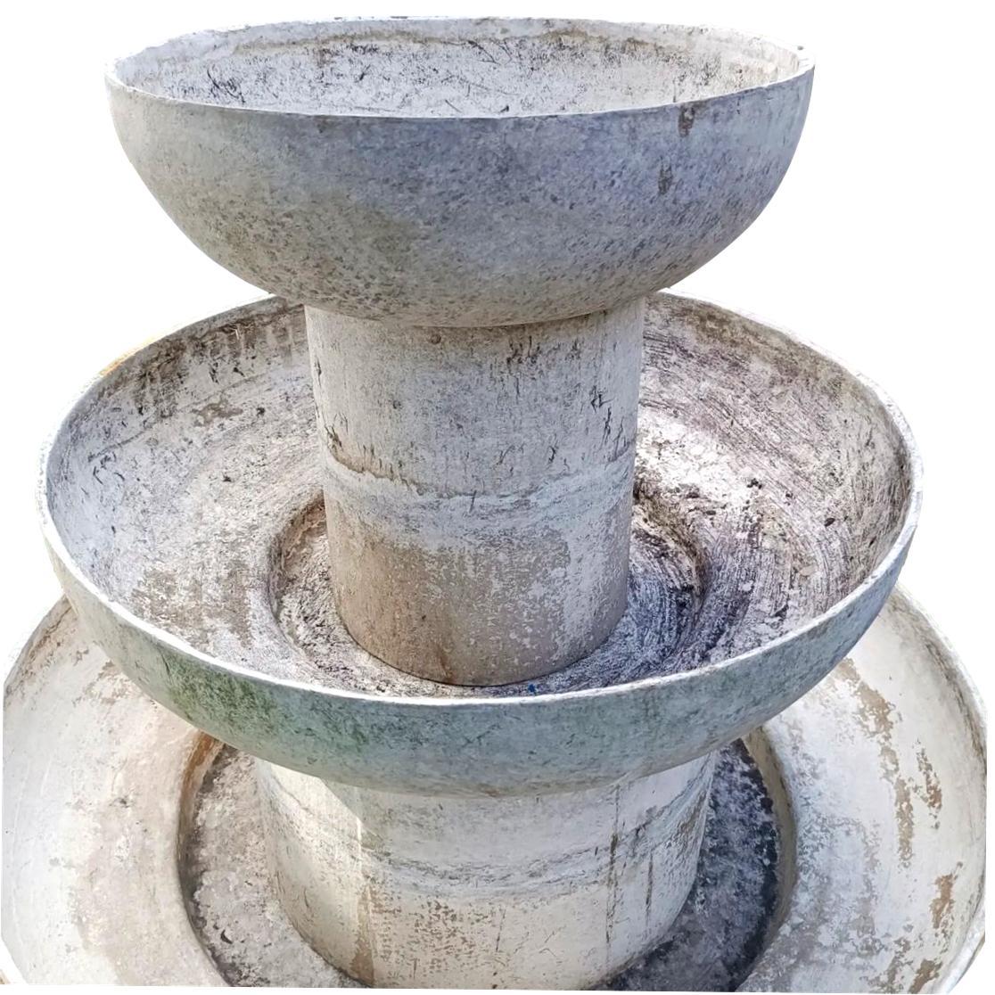 Extremely rare concrete fountain by Willy Guhl for Eternit. Fabricated out of 8 pieces of fiber cement. Hand made in Switzerland, 1960s. Only such fountain available for sale.. Great sculpture and object. Four tiers. Just under 4 feet tall. Four