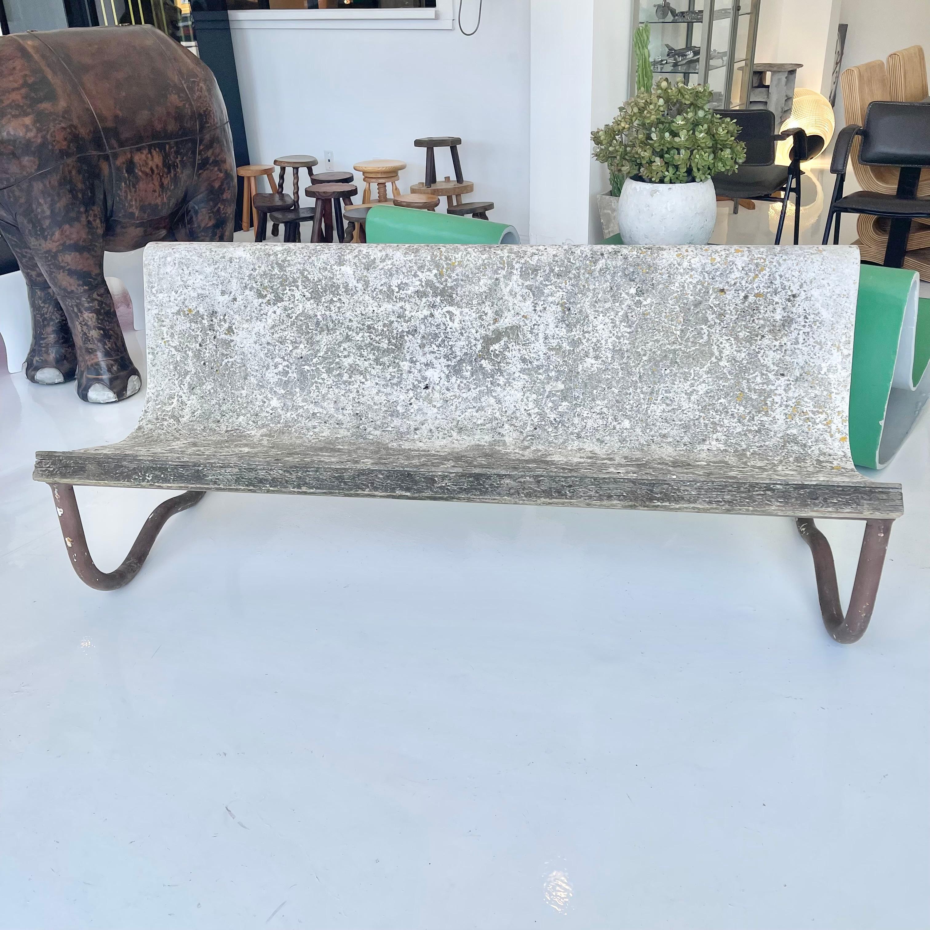 Remarkable mid-century floating concrete bench by Swiss Architect Willy Guhl. Circa 1960s. Sturdy and substantial. Holds the weight of 3 adults easily. Perfect minimal design as is common with the Swiss designer. The seat is made of fiber cement
