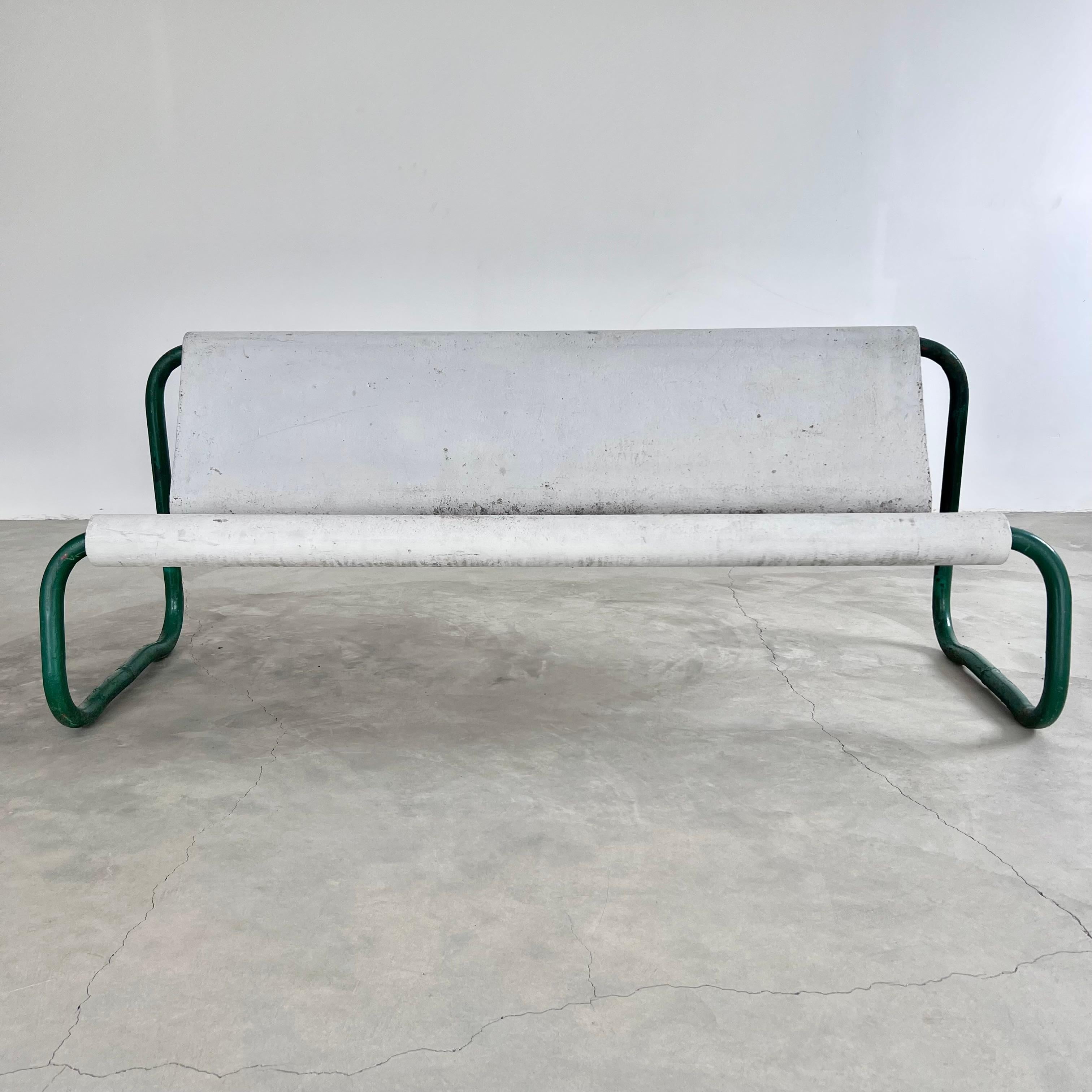 Remarkable mid-century floating concrete bench by Swiss Architect Willy Guhl. Circa 1960s. Sturdy and substantial. Holds the weight of 3 adults easily. Perfect minimal design as is common with the Swiss designer. The seat is made of fiber cement