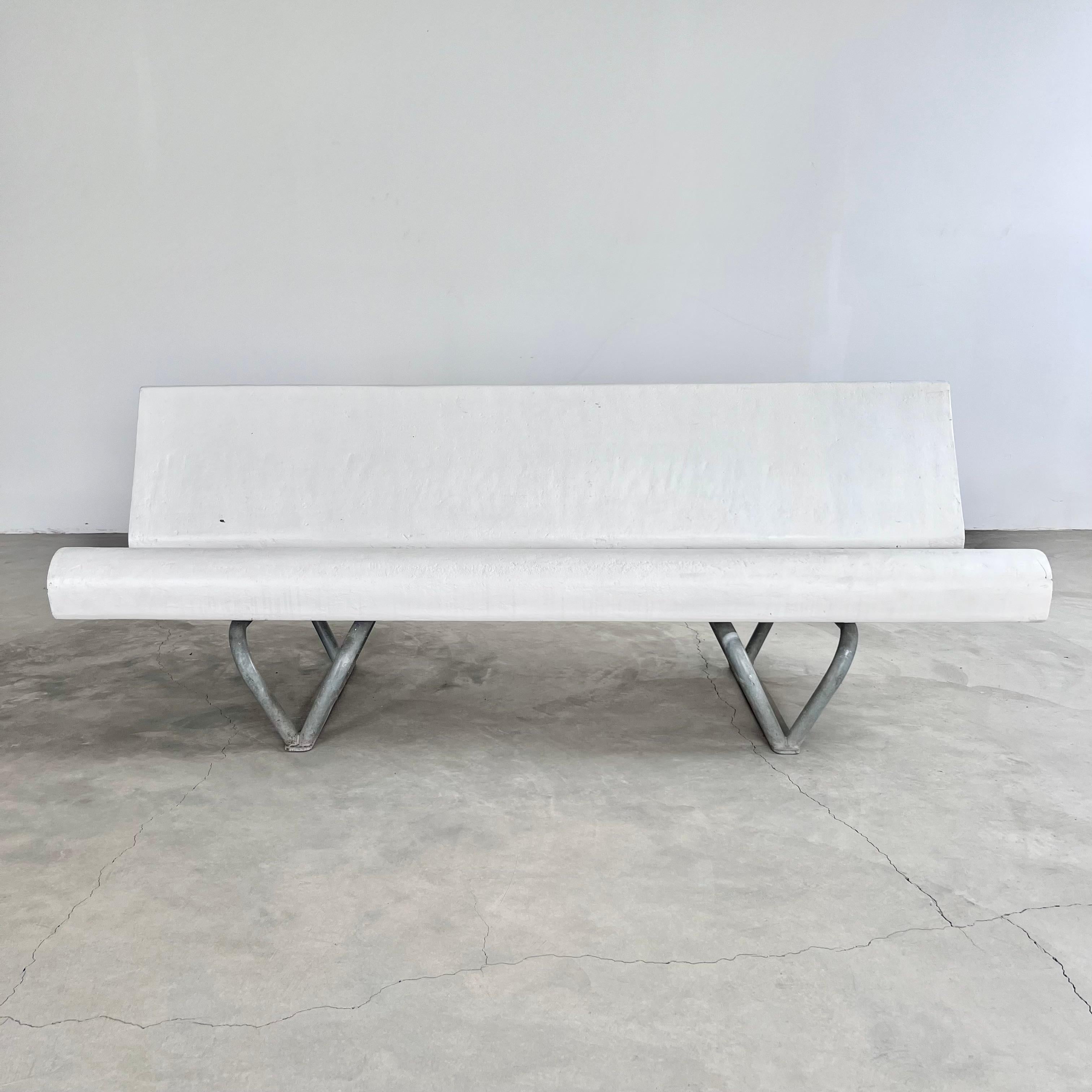 Sculptural midcentury concrete loop bench by Swiss Architect Willy Guhl, circa 1960s. Sturdy and substantial. Holds the weight of 3 adults easily. This incredibly rare design is a perfect modern and minimal bench with unmatched details and presence.