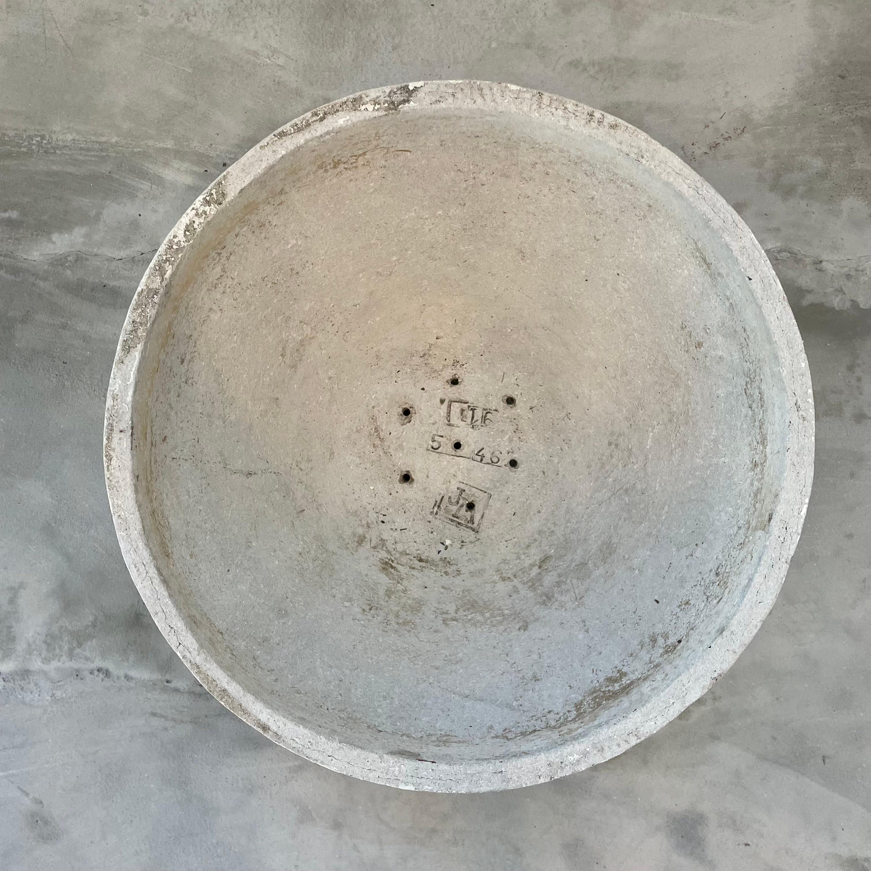 Large concrete bowl planter by Swiss architect Willy Guhl. Original grey patina with faded white paint. Beautifully minimalist piece. Made in the 1960s in Switzerland. Great scale. Stamped at base of planter for authenticity.