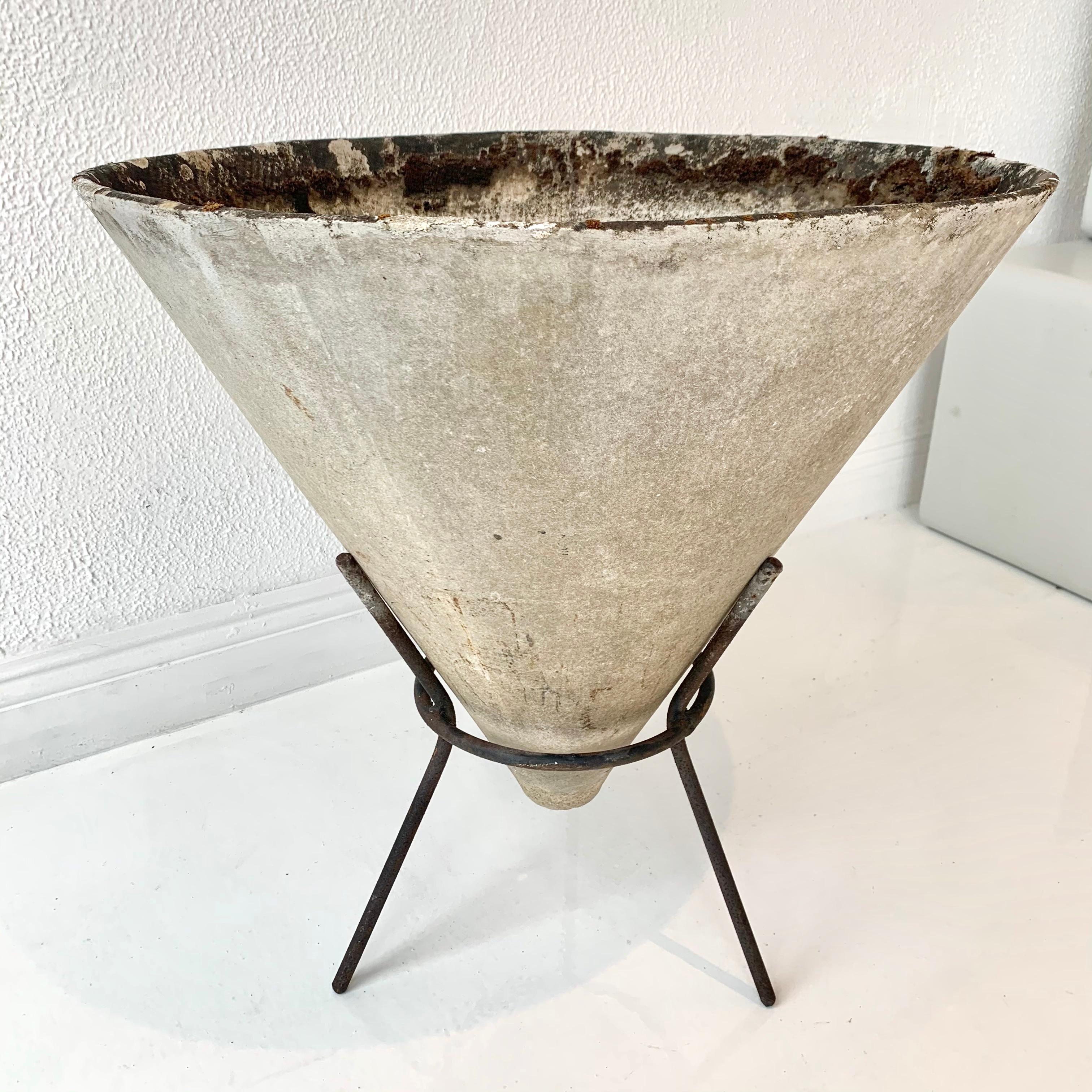 Unusual set of 5 concrete cone planters by Will Guhl. Made in the 1960s, in Switzerland. Inverted concrete cone sits comfortably in an iron tripod stand. Great patina and coloring to each planter. Bottom of cone floats a few inches off of the