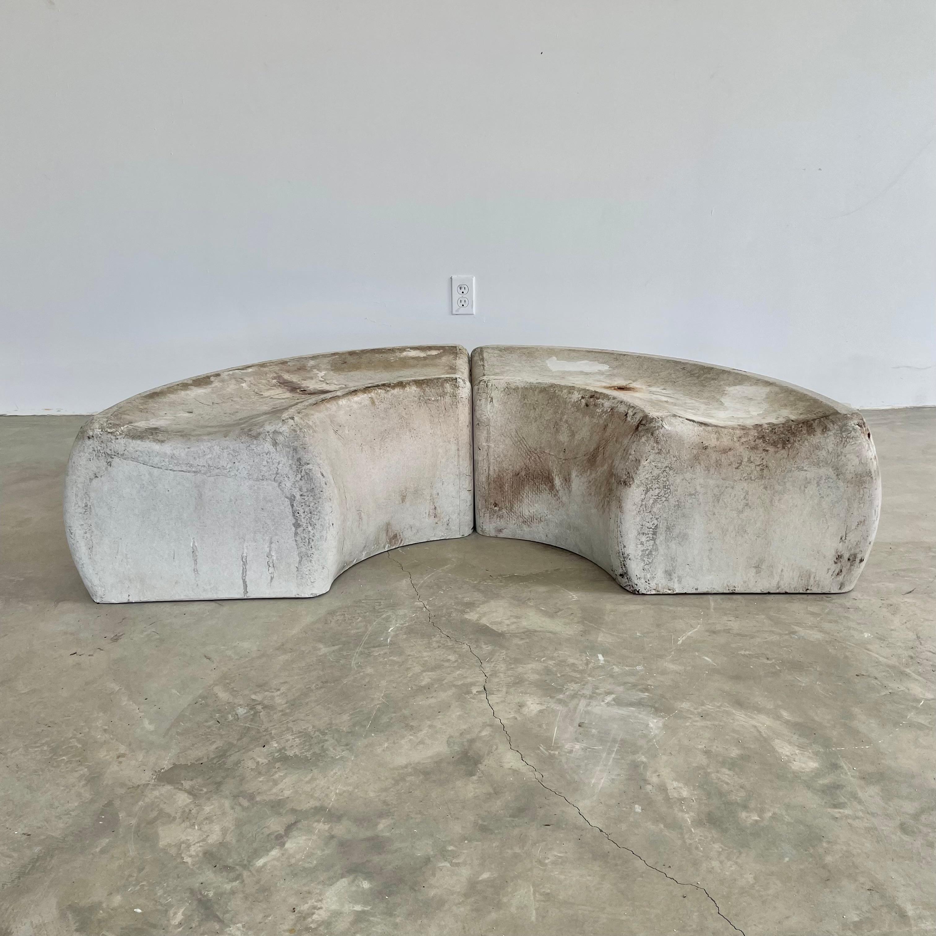 Substantial midcentury concrete seat/ bench by Eternit, circa 1960s. Perfect minimal concave design with convex sides that bow out gently. The bench is made of solid fiber cement which allows it to develop an incredible patina. Factory drilled