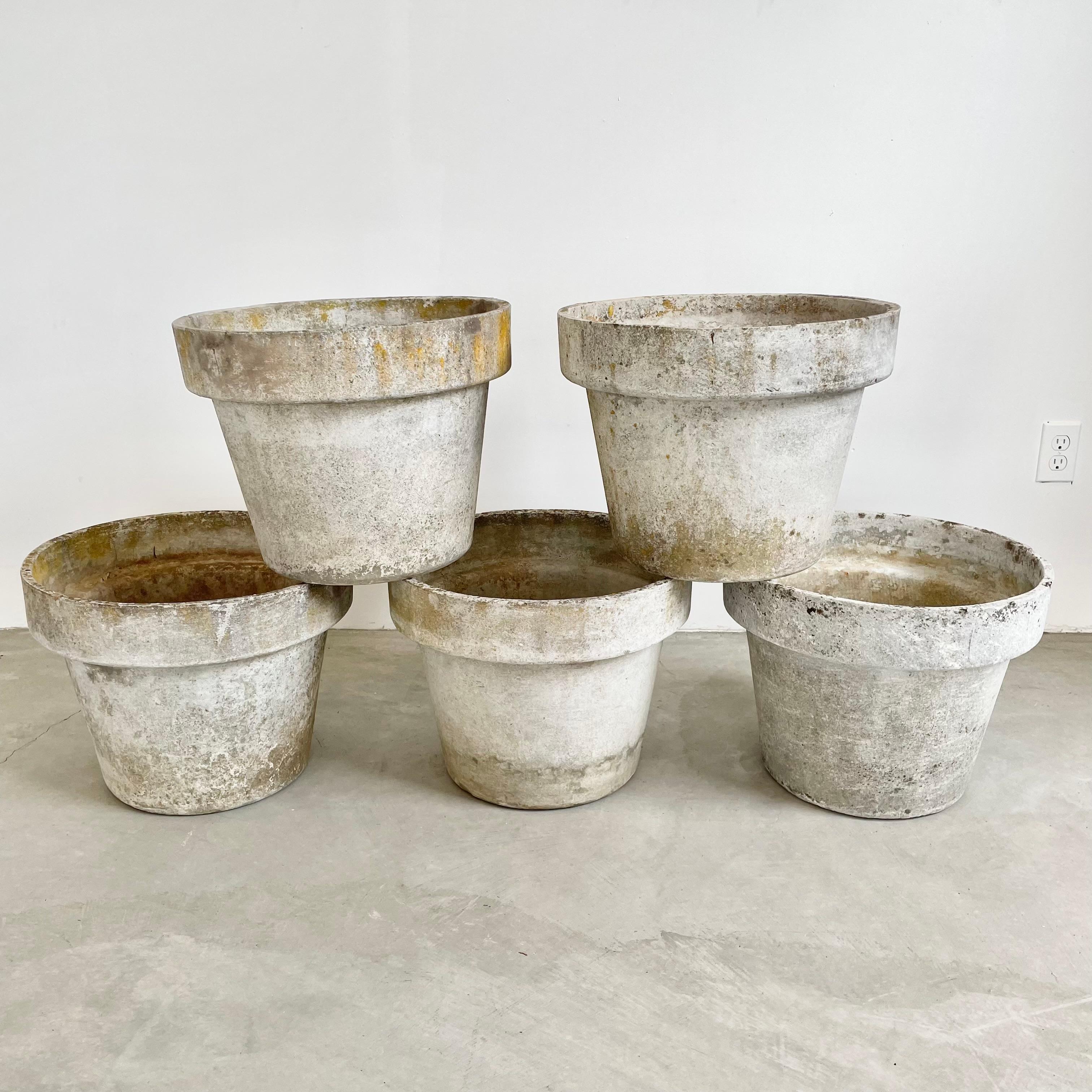 Perfect large concrete flower pots by Willy Guhl. Made in Switzerland in the 1960s. Great vintage condition. Classic flower pot design with large basin and banded lip at the top. Each planter with a slightly different patina. 5 available. Priced