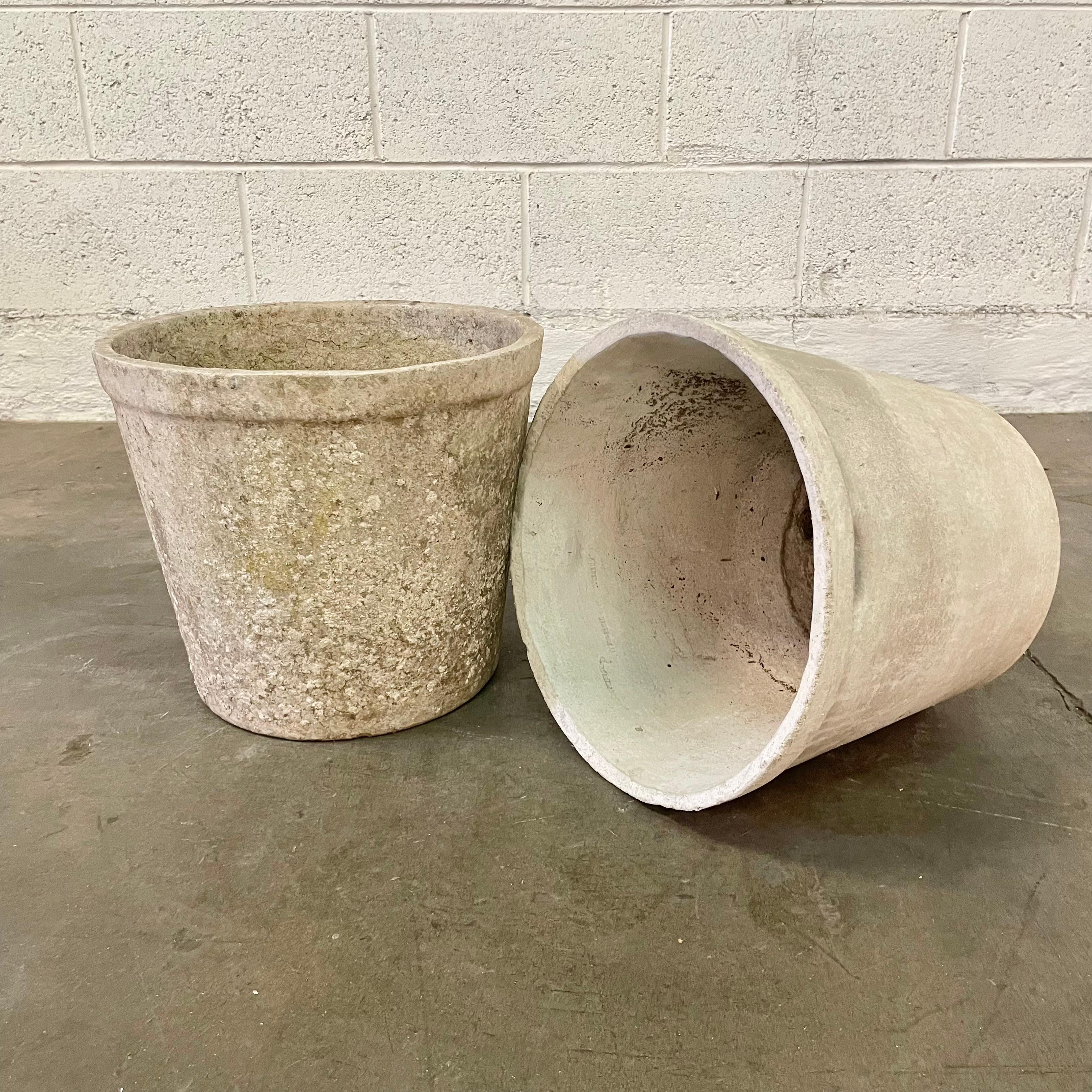Perfect concrete flower pots by Willy Guhl. Made in Switzerland in the 1960s. Great vintage condition with unique patina on each as shown. Classic flower pot design with large basin and banded lip at the top. 2 available. Priced individually. 


