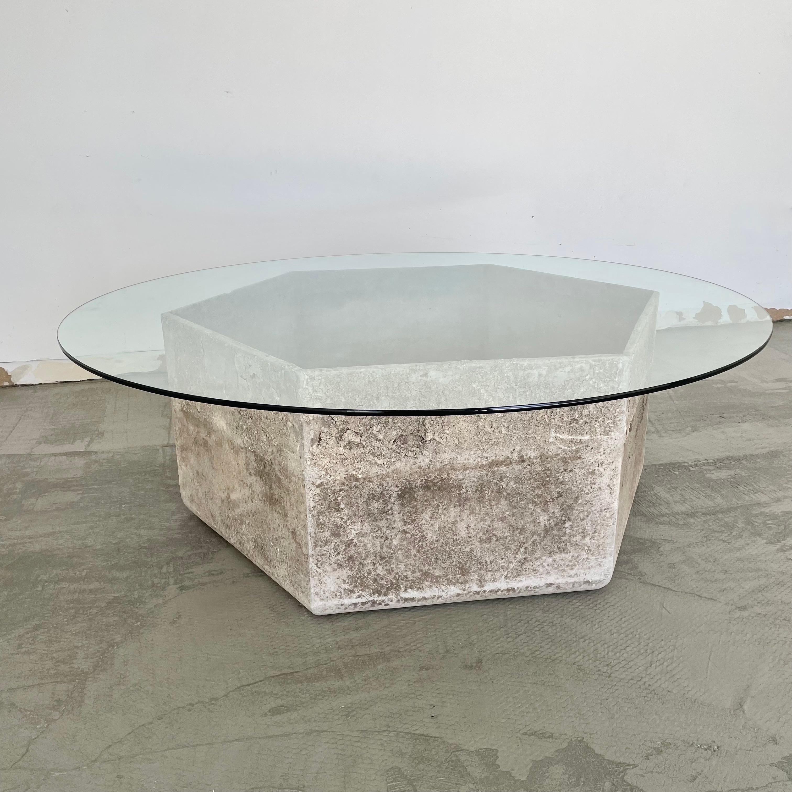 Fantastic hexagon table by Swiss architect Willy Guhl for Eternit. Great scale and unique shape. Suitable for indoor and outdoors. Only one available. New pencil edge glass top. Stunning sculptural table. 

 The base dimensions are 36.75